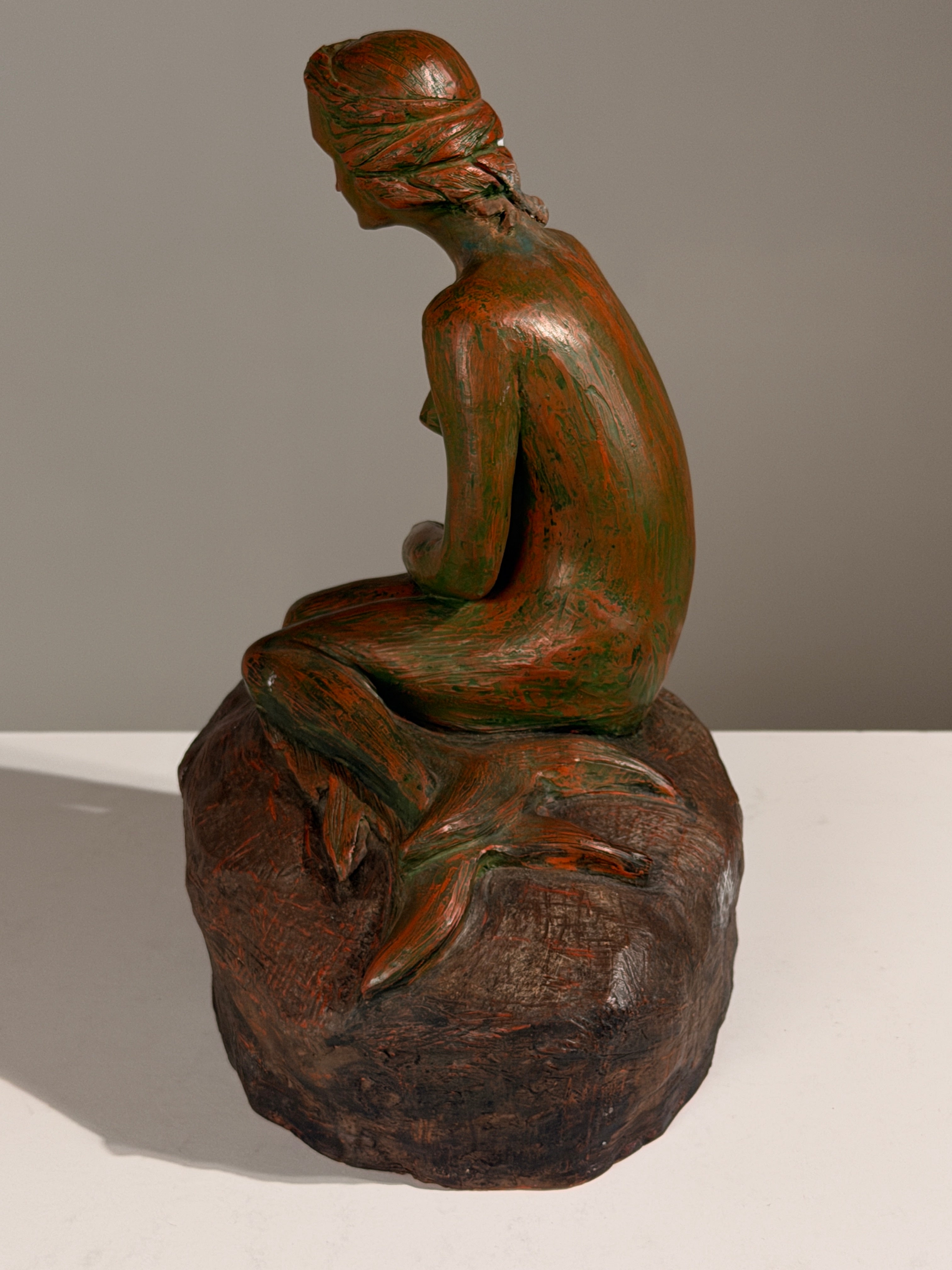 Seated female nude on a rock, terracotta, G. Lenaerts, circa 1930 — side angle