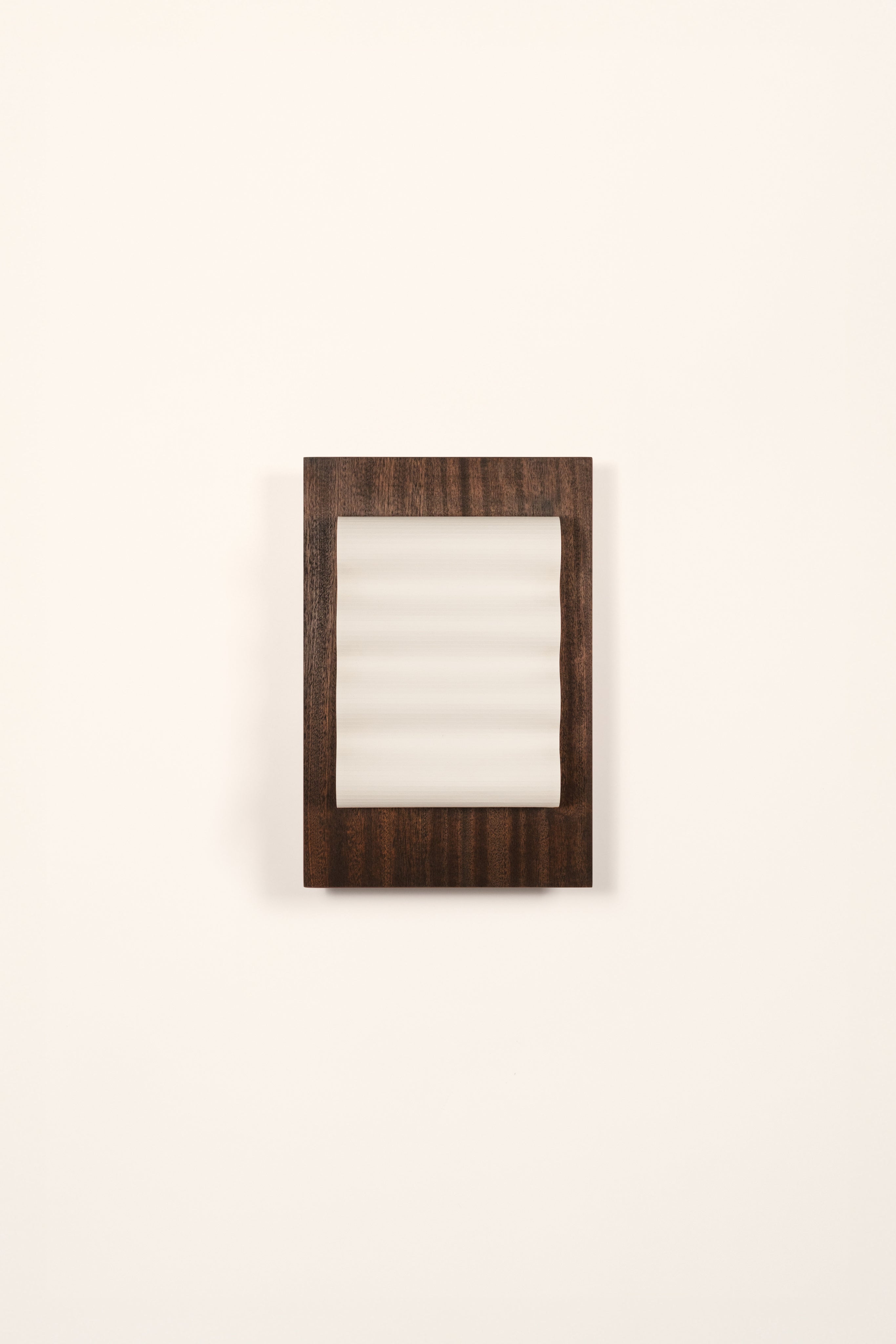 Frame" Wood S — side angle showing dark wood frame and frosted glass