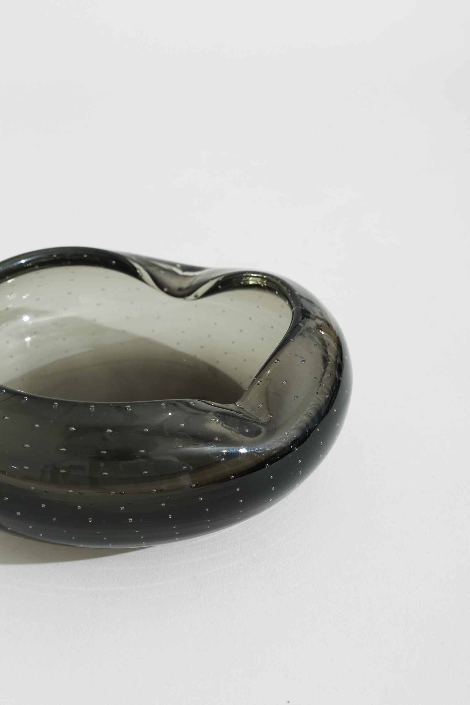 Italian Glass Catchall — angled view highlighting dark glass texture