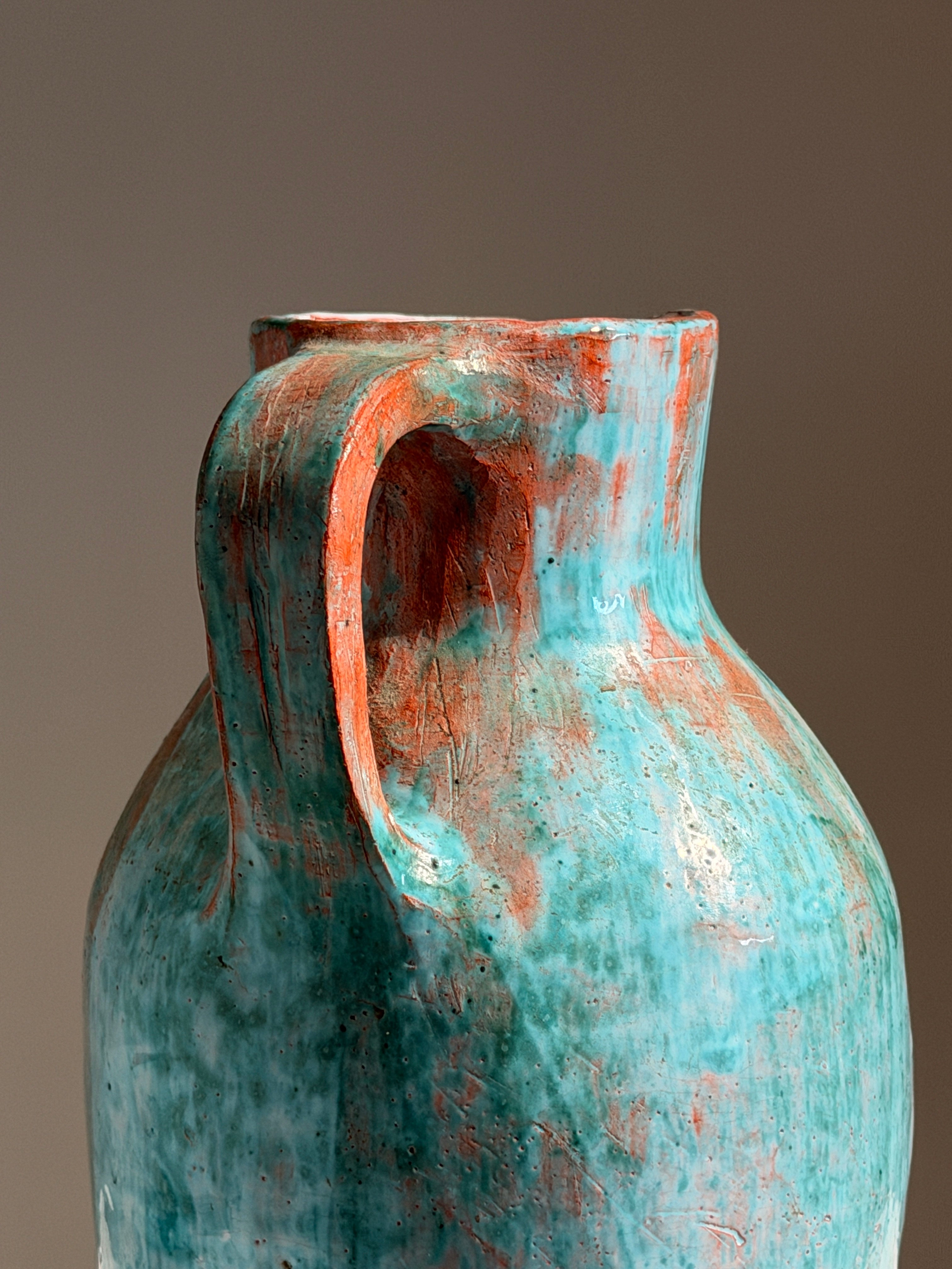 Large pitcher in green glazed earthenware, south of France, circa 1960. — close-up
