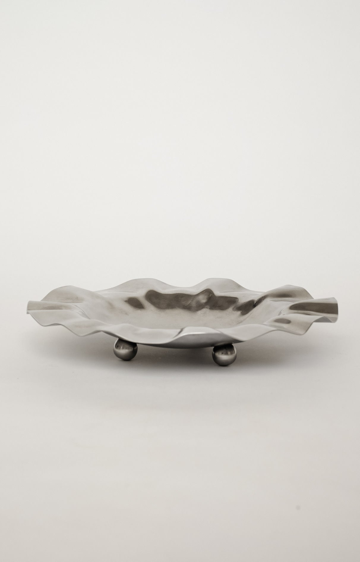 Wavy Display Bowl with Ball Feet by septembre studios | The Oblist