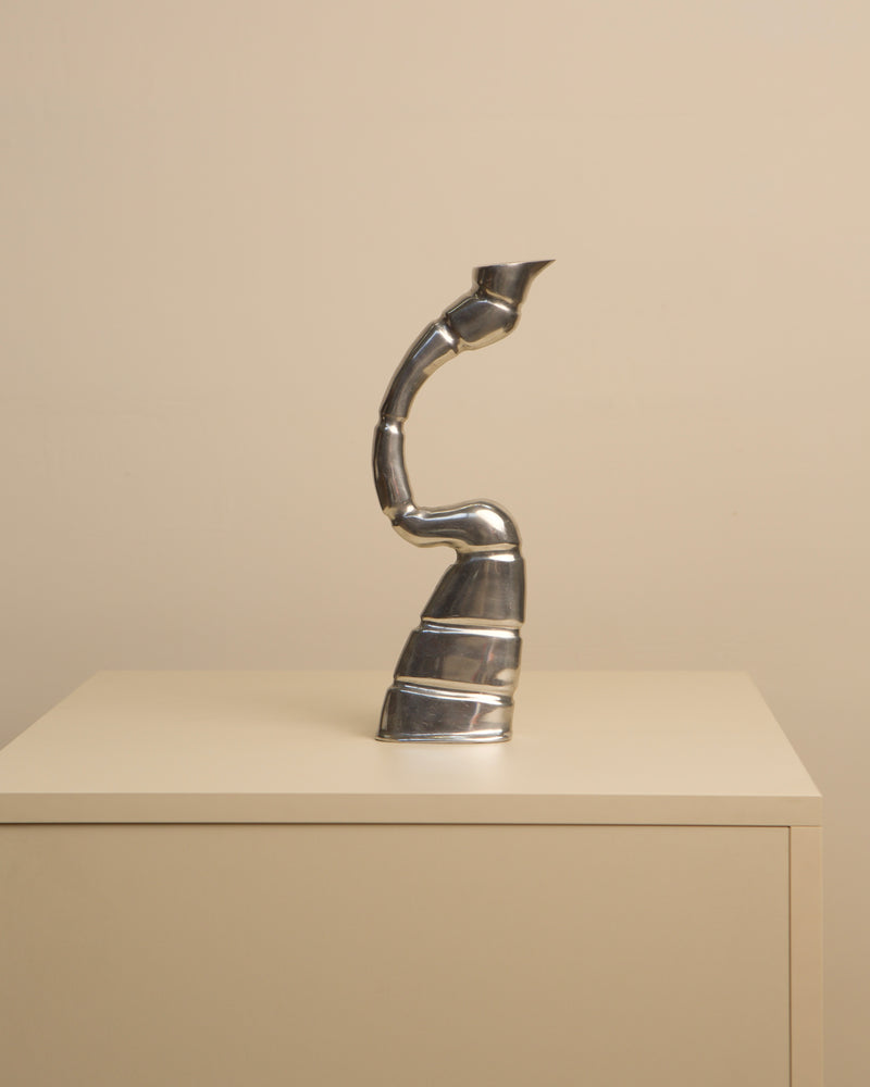 Vintage chrome Scorpion candleholder with curved sculptural design
