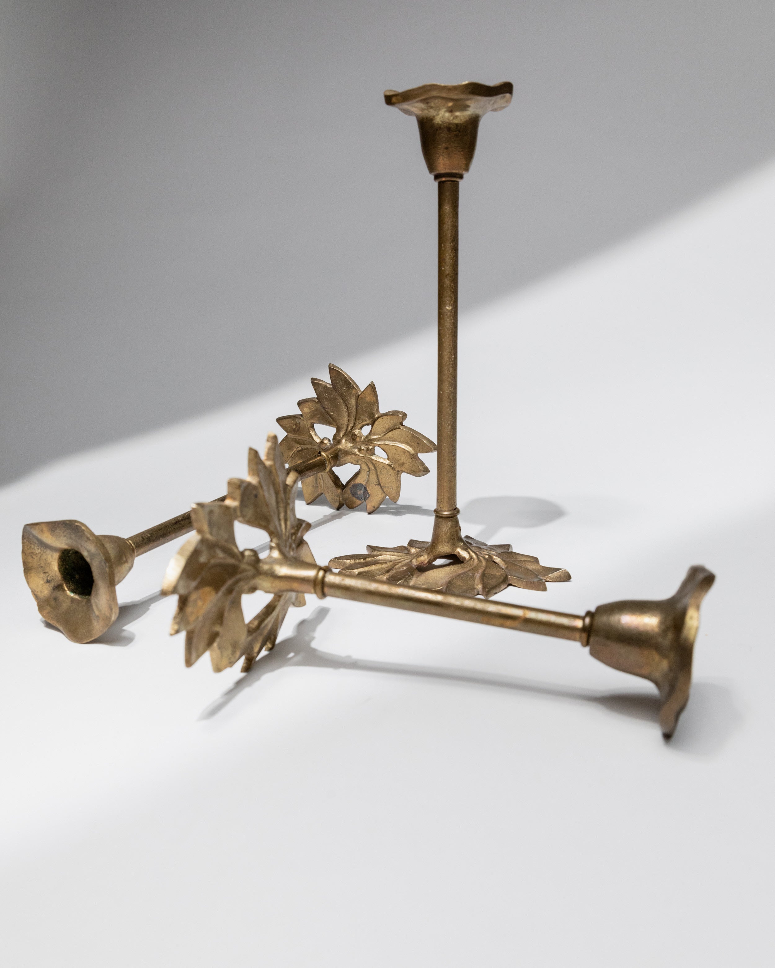 Brass candle holder with decorative floral motifs, Italy 1940s