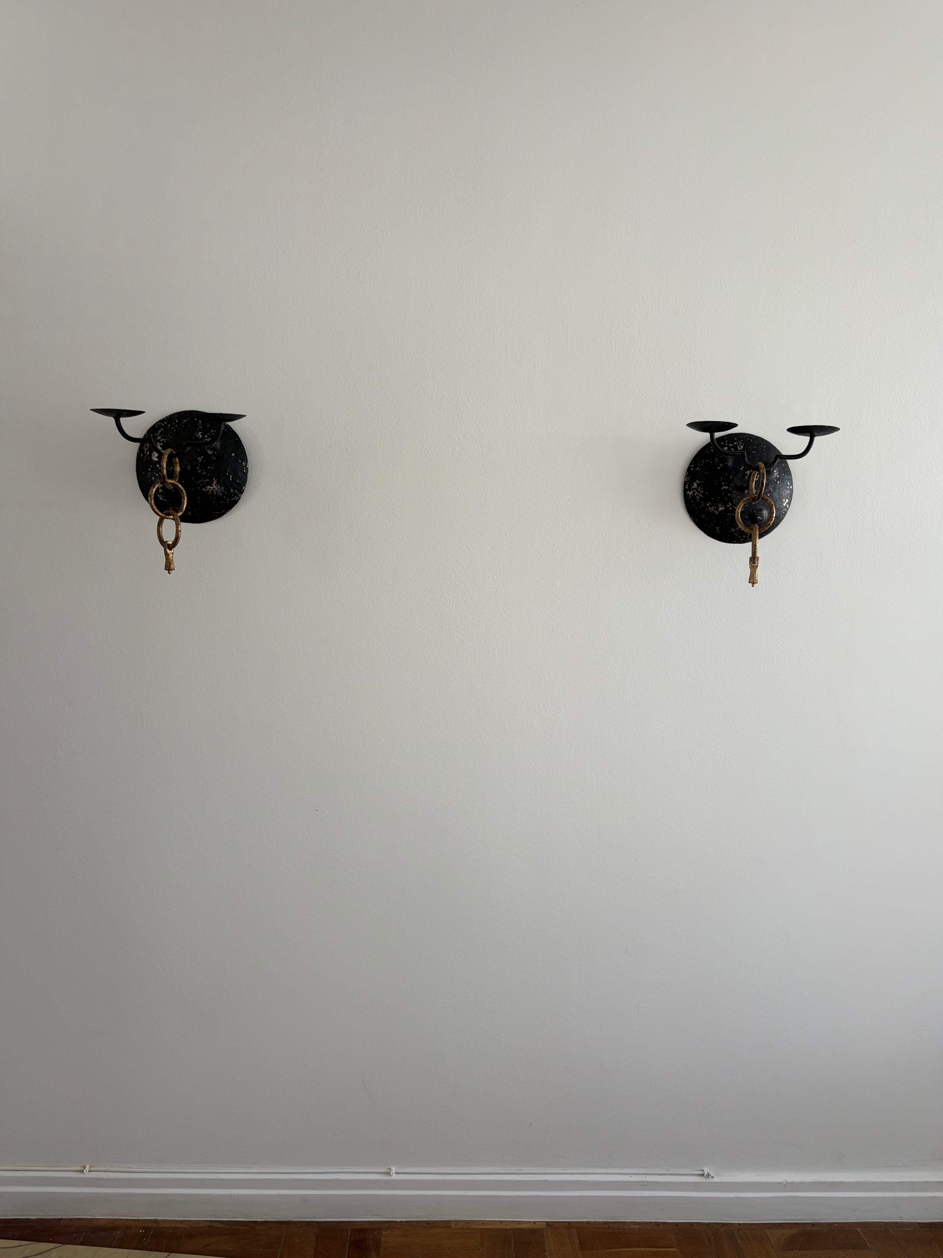 Pair of Brutalist Wall Candleholders, Iron and Brass, Iberian Peninsula, mid-20th century — lifestyle setting
