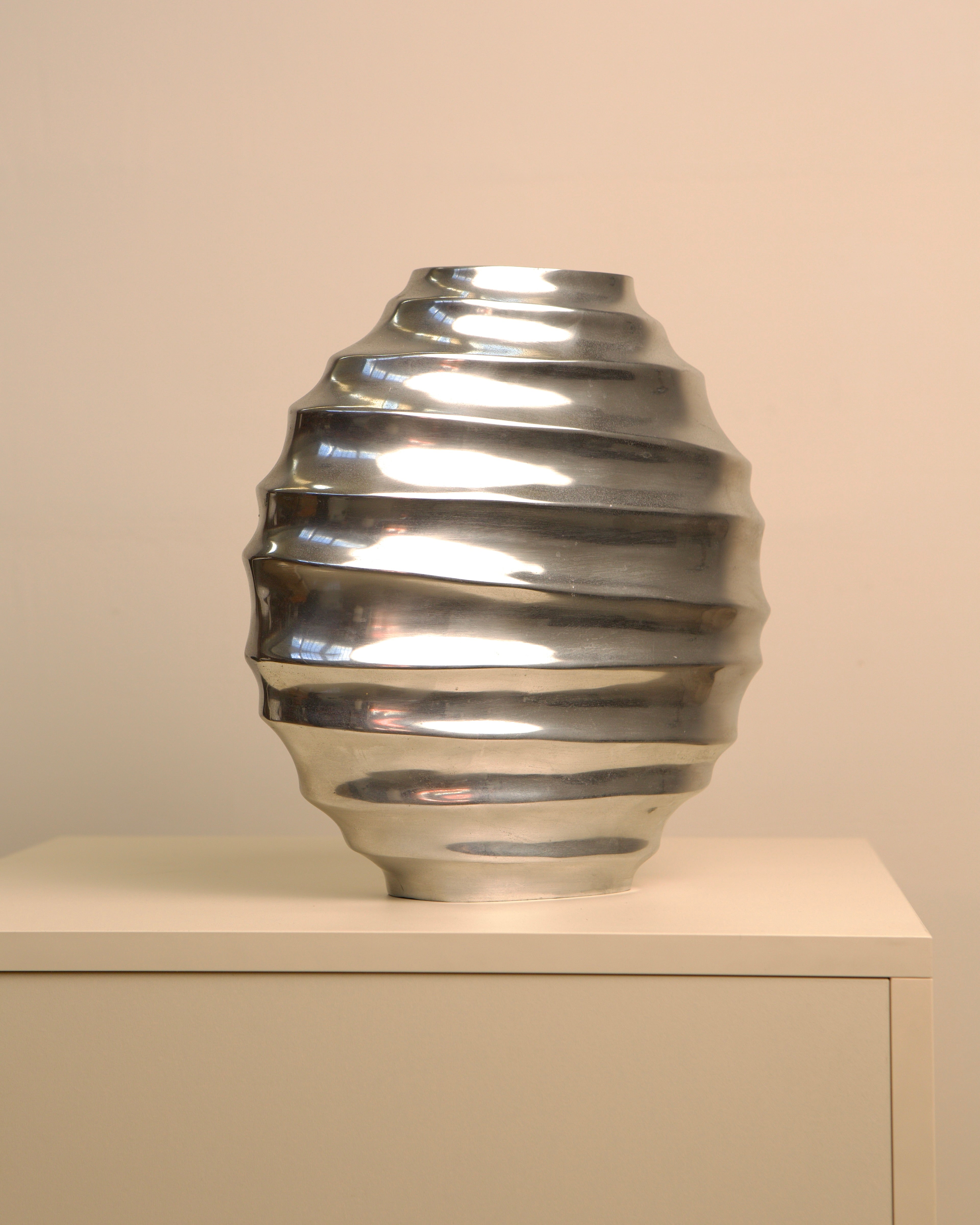 Large ribbed cast aluminum vase with metallic finish 1980s