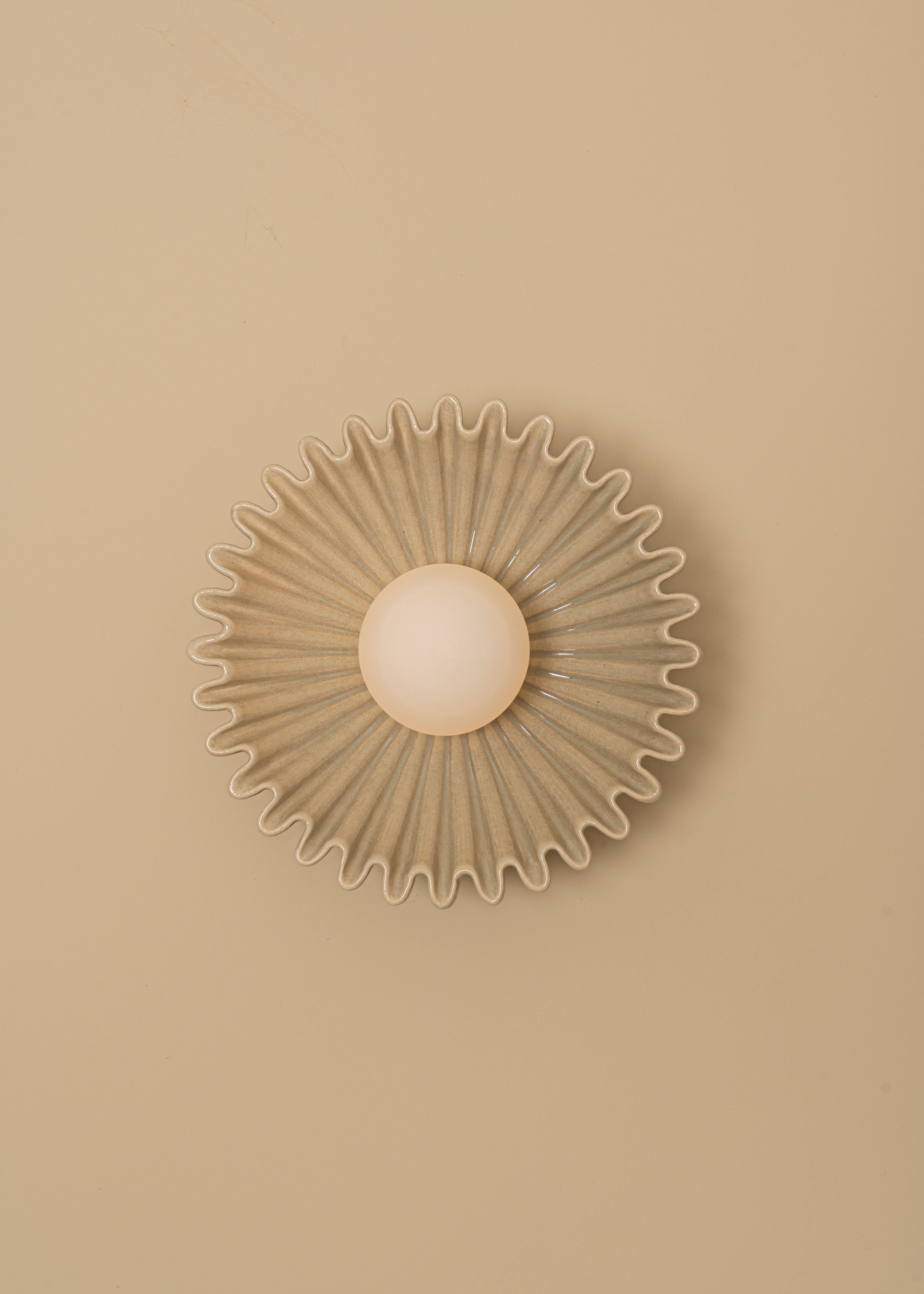 'Ostro' Sea Ceramic Wall Light — lifestyle setting