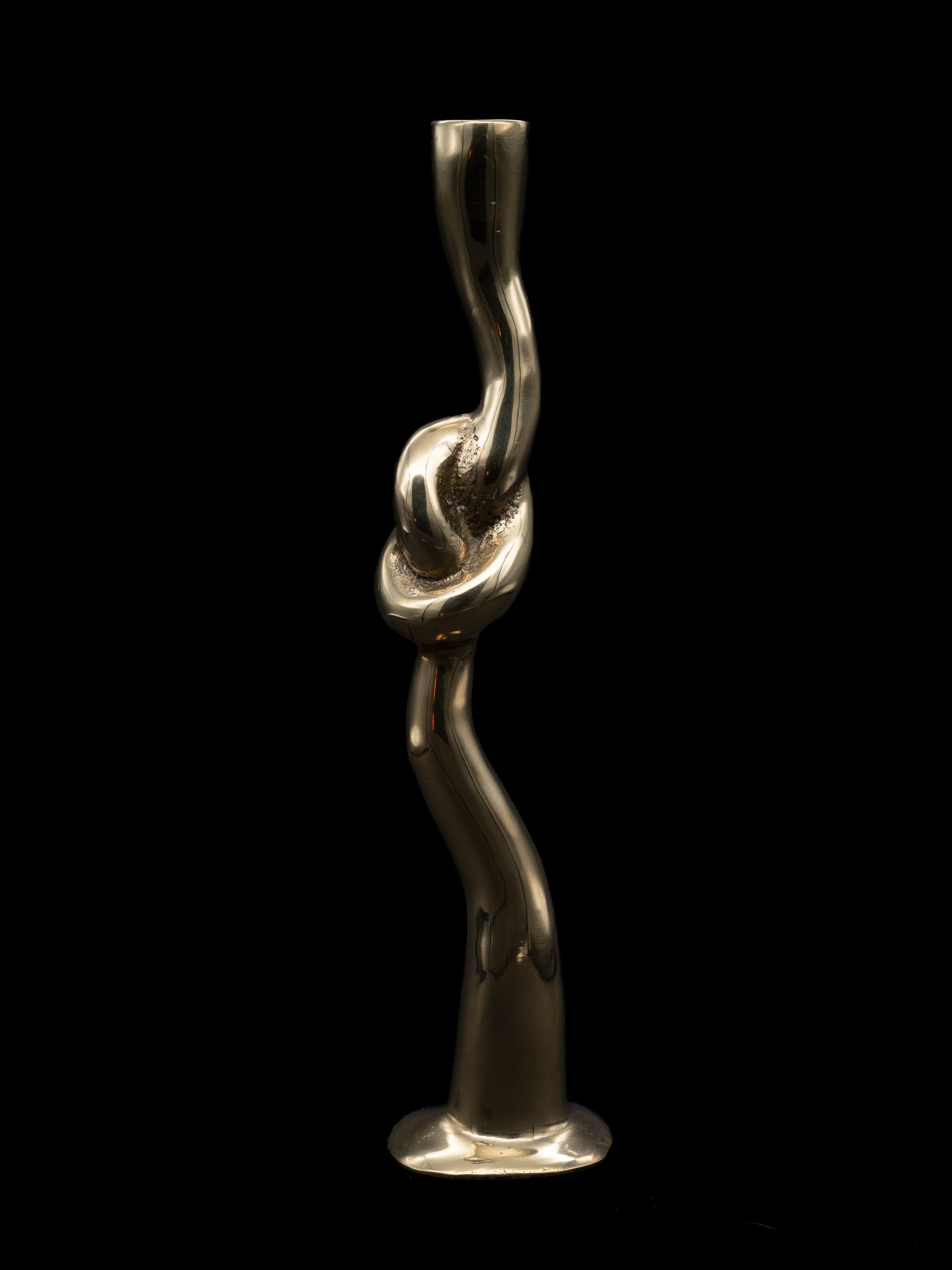 Fluid Knot Candlestick, Spain, c 1970s — close-up of polished brass detail