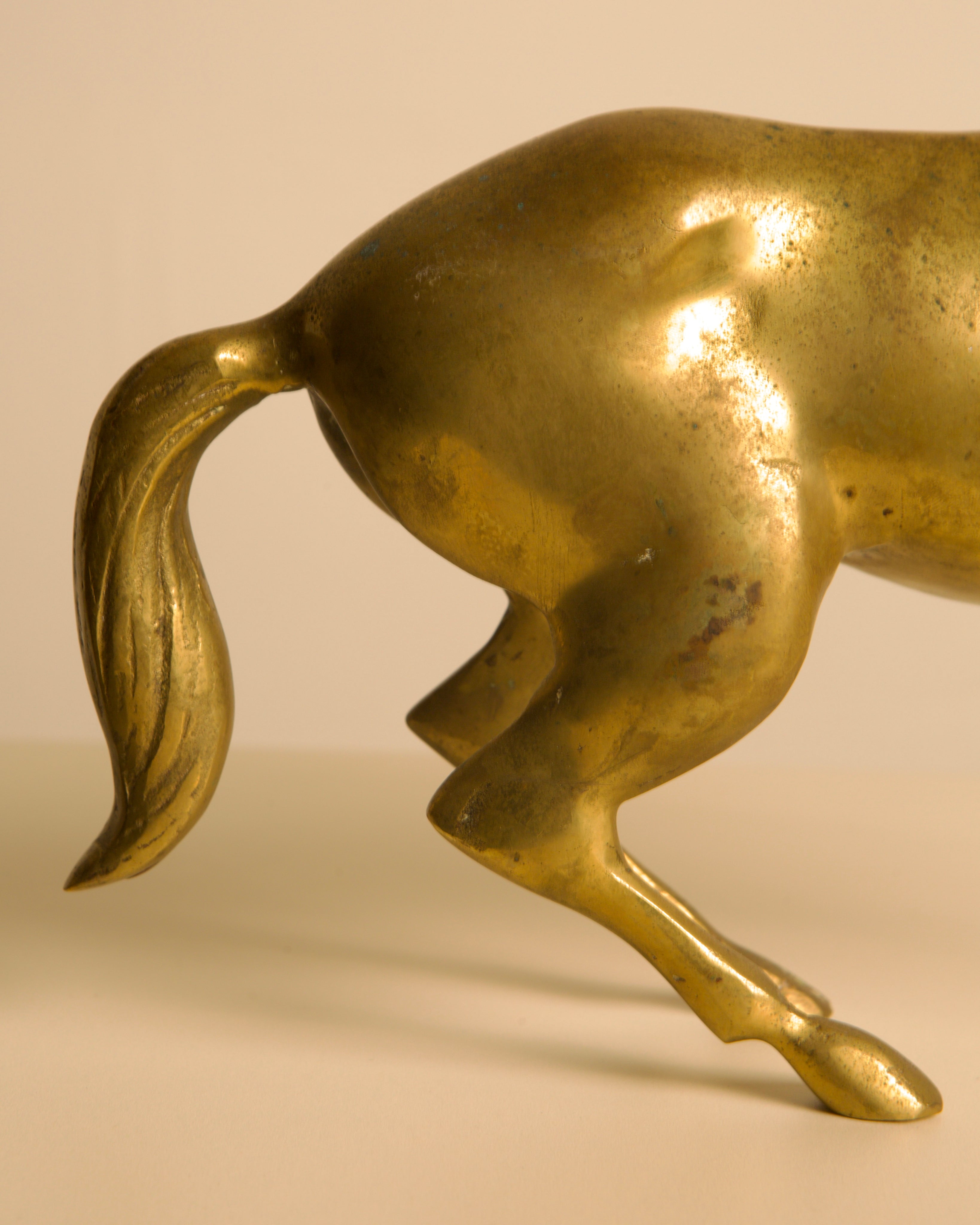 Golden brass horse sculpture in dynamic pose, Italian 1960s design