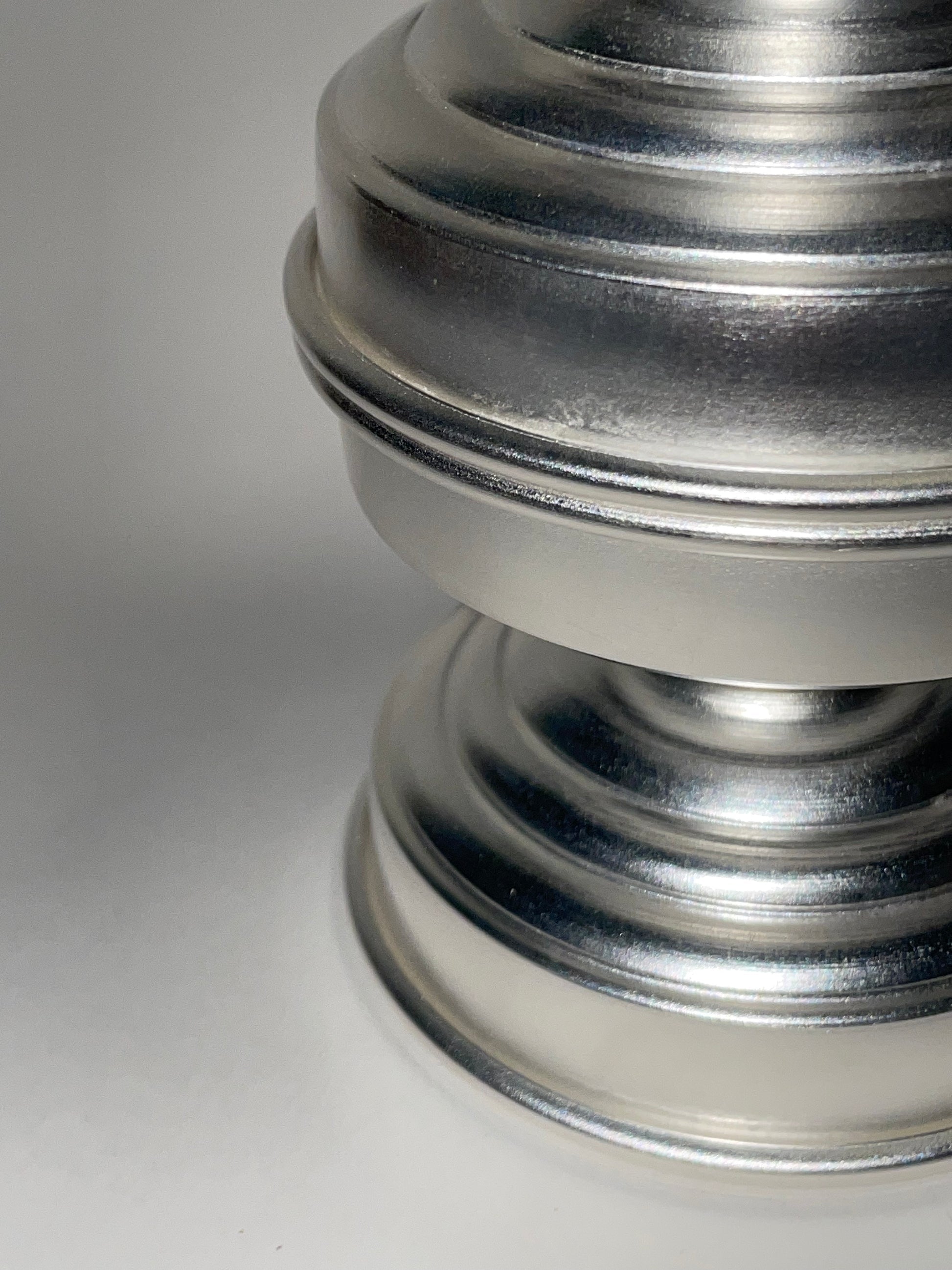 Silver Plated Candle Holders in Brass — close-up of polished silver surface