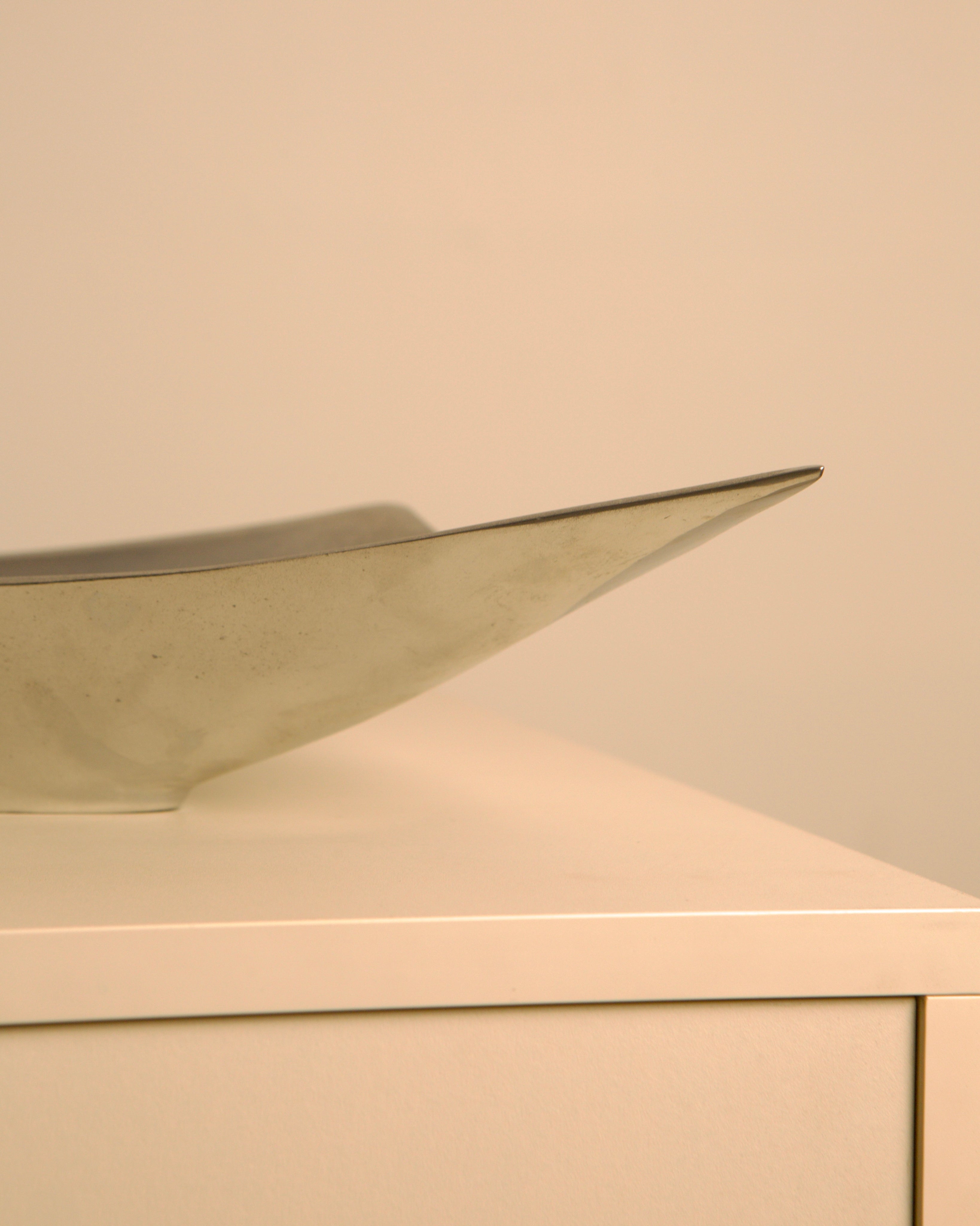 Italian "Triangle" aluminium catch-all, 1980s — lifestyle setting