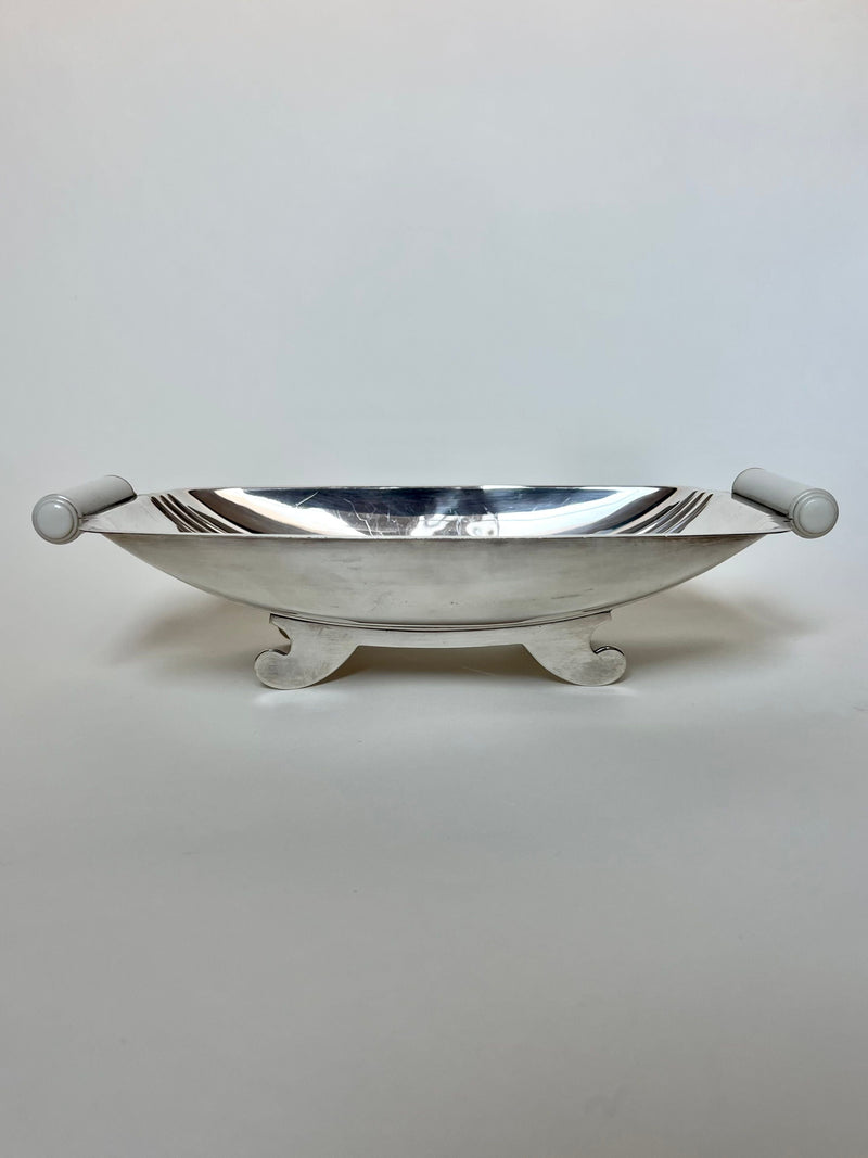 Polished silver Art Deco bread dish with cylindrical handles