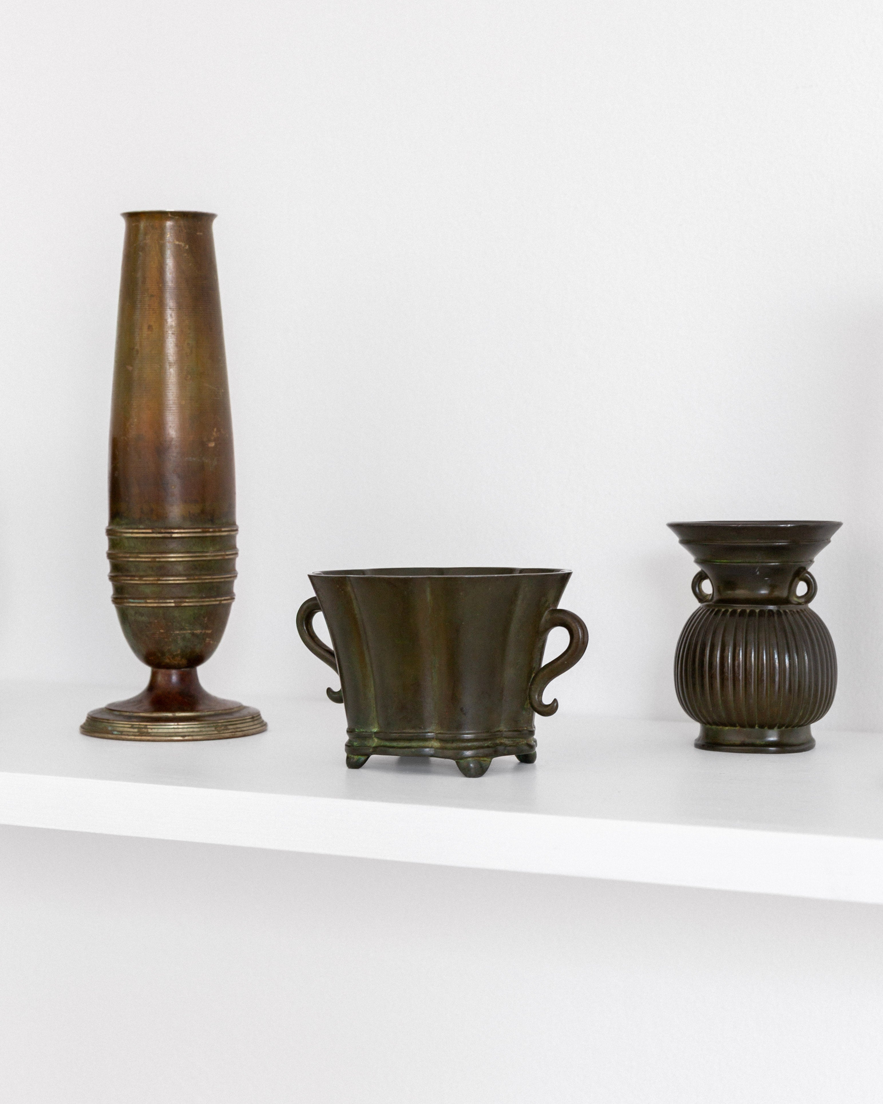 Art Deco Miniature Jardiniere by Just Andersen, Denmark, 1930s — side angle on white shelf with other vases