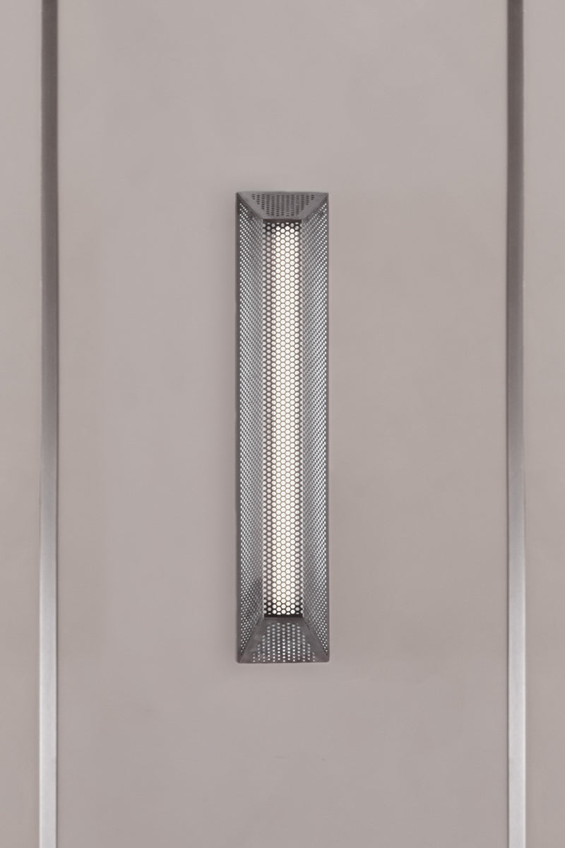 TRAP 50 — close-up of perforated metal wall light
