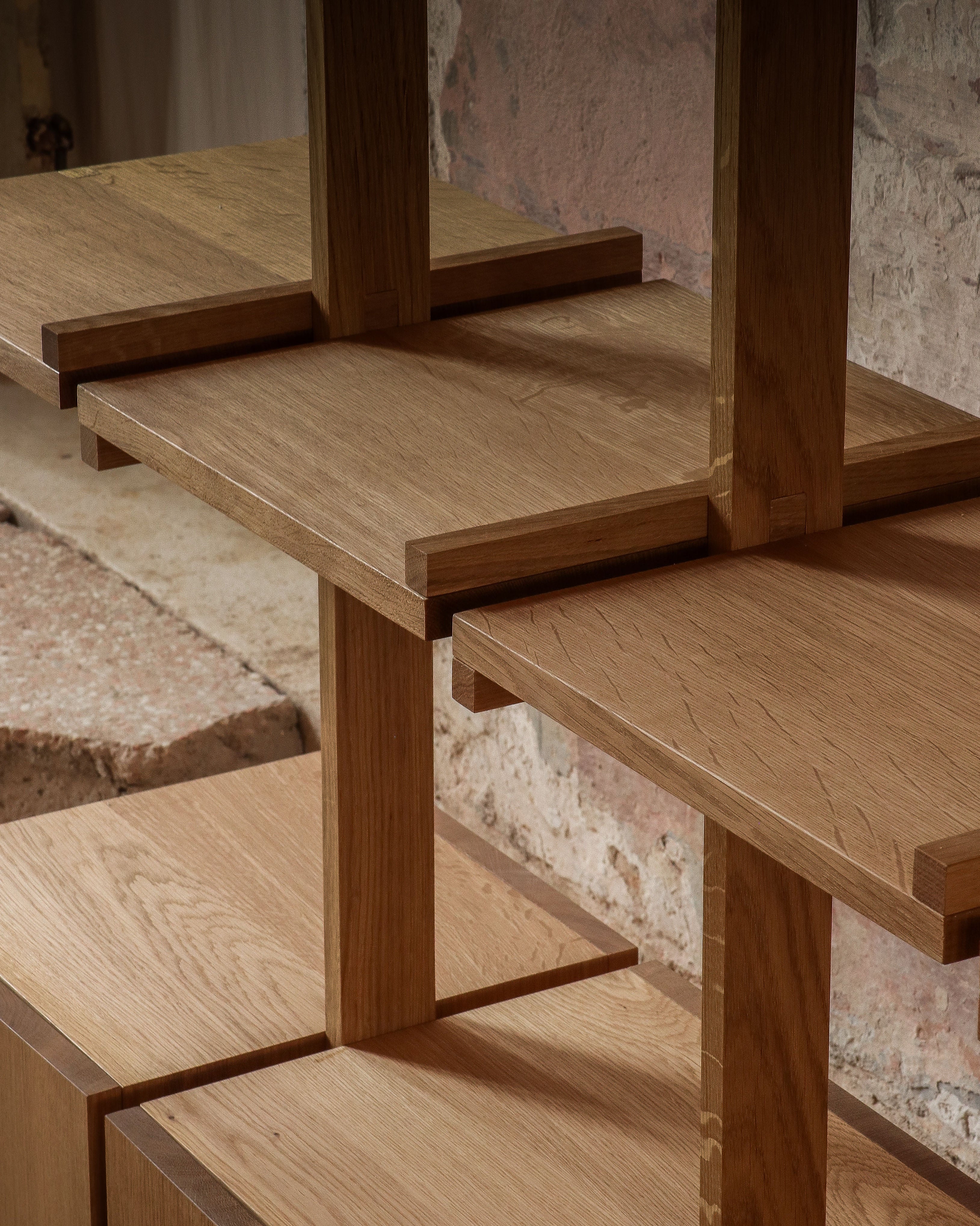 Close-up detail of Veliero oak bookshelf joinery and shelves