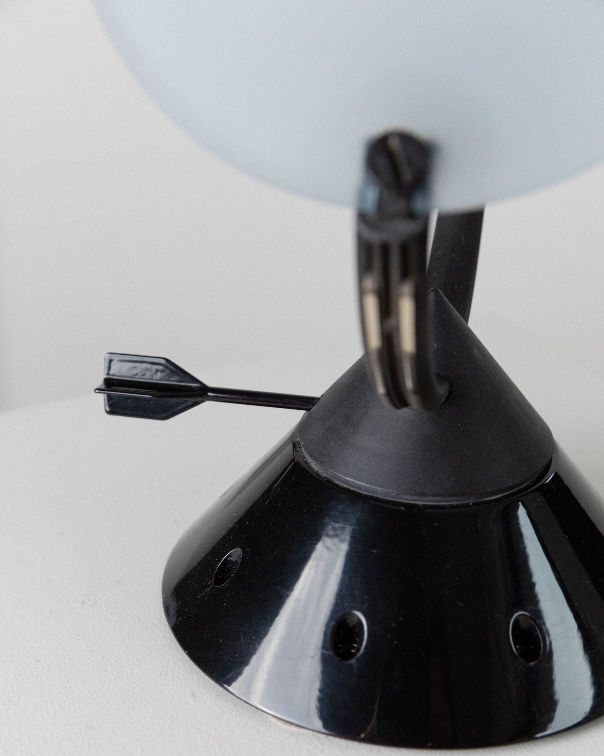 Table Lamp by Lamperti model Sestante, Italy 1980s — close-up of black base with arrow detail