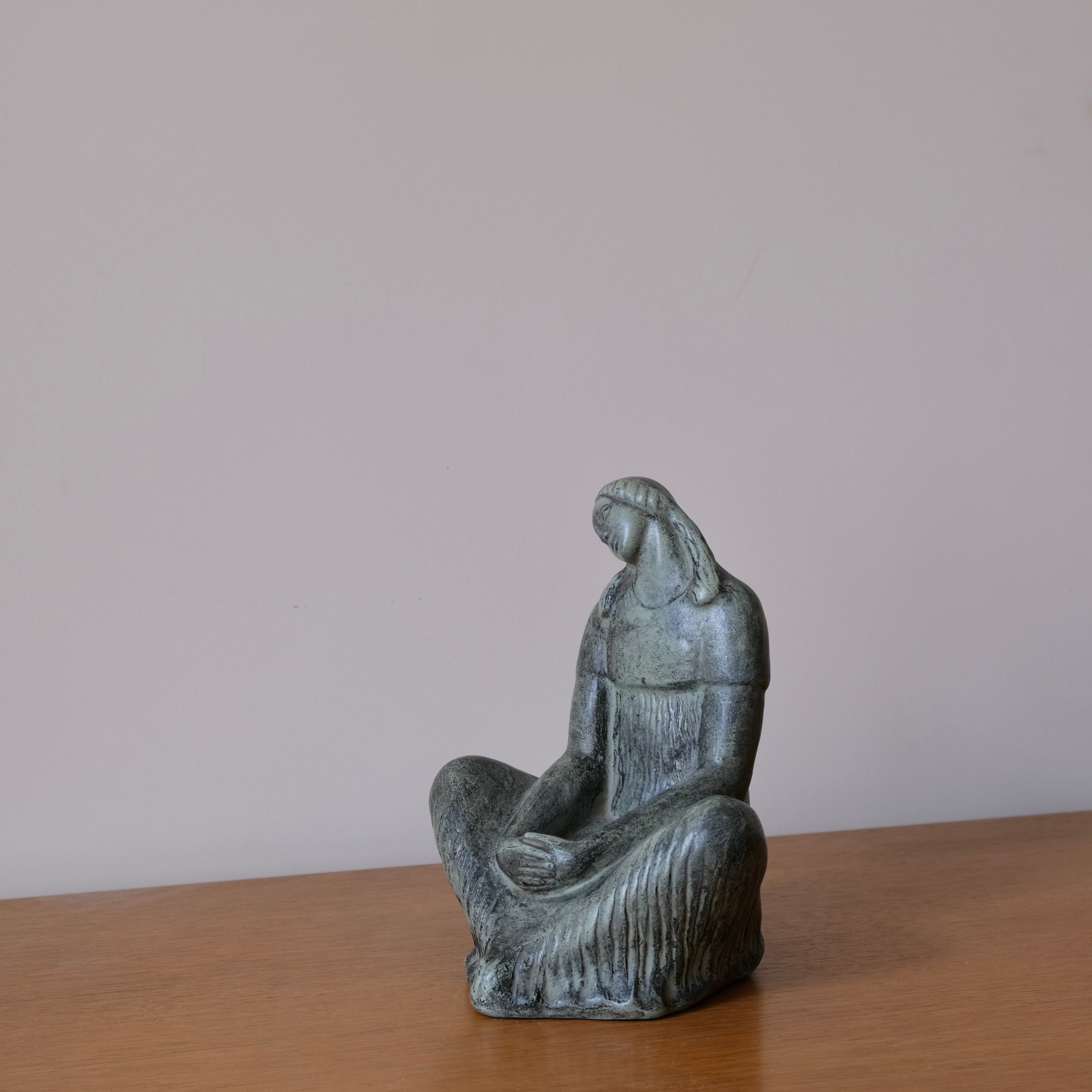 Fidel Aguilar Marco Ceramic Sculpture | Spain | 1930s — side angle on wooden surface
