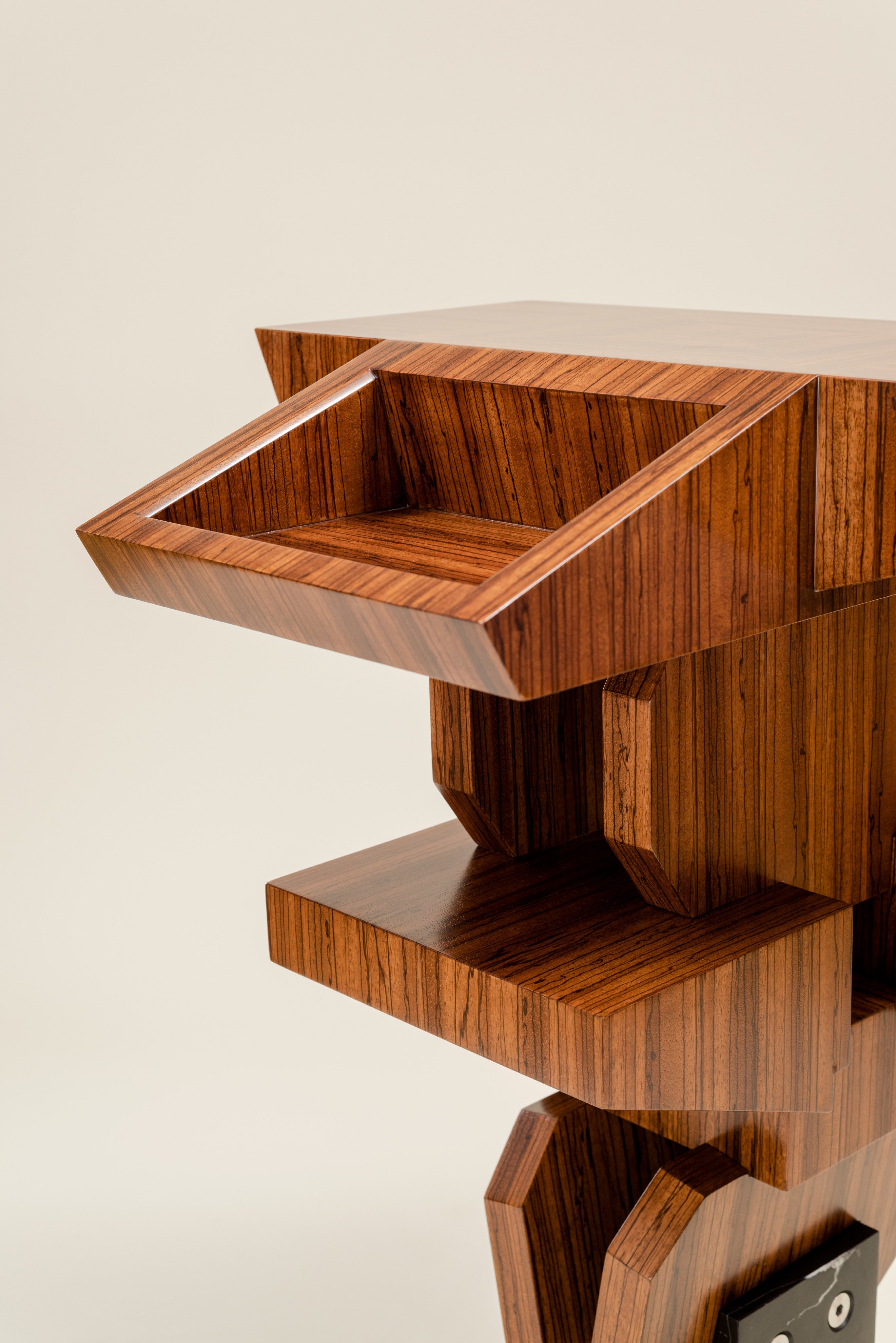 Pyramiss Pedestal Table — close-up of rich wood grain detail