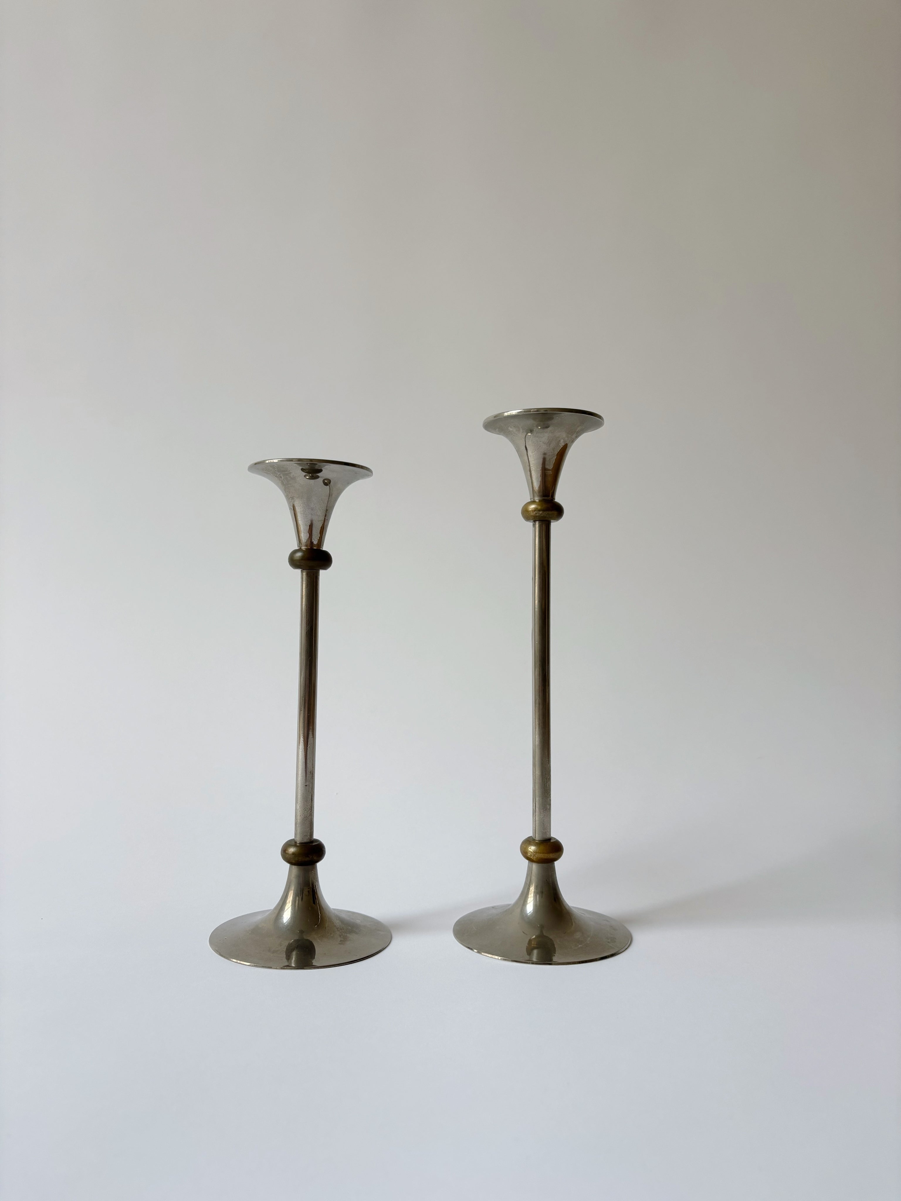 2 Metal Postmodern Candleholders — side angle showing metallic finish and design