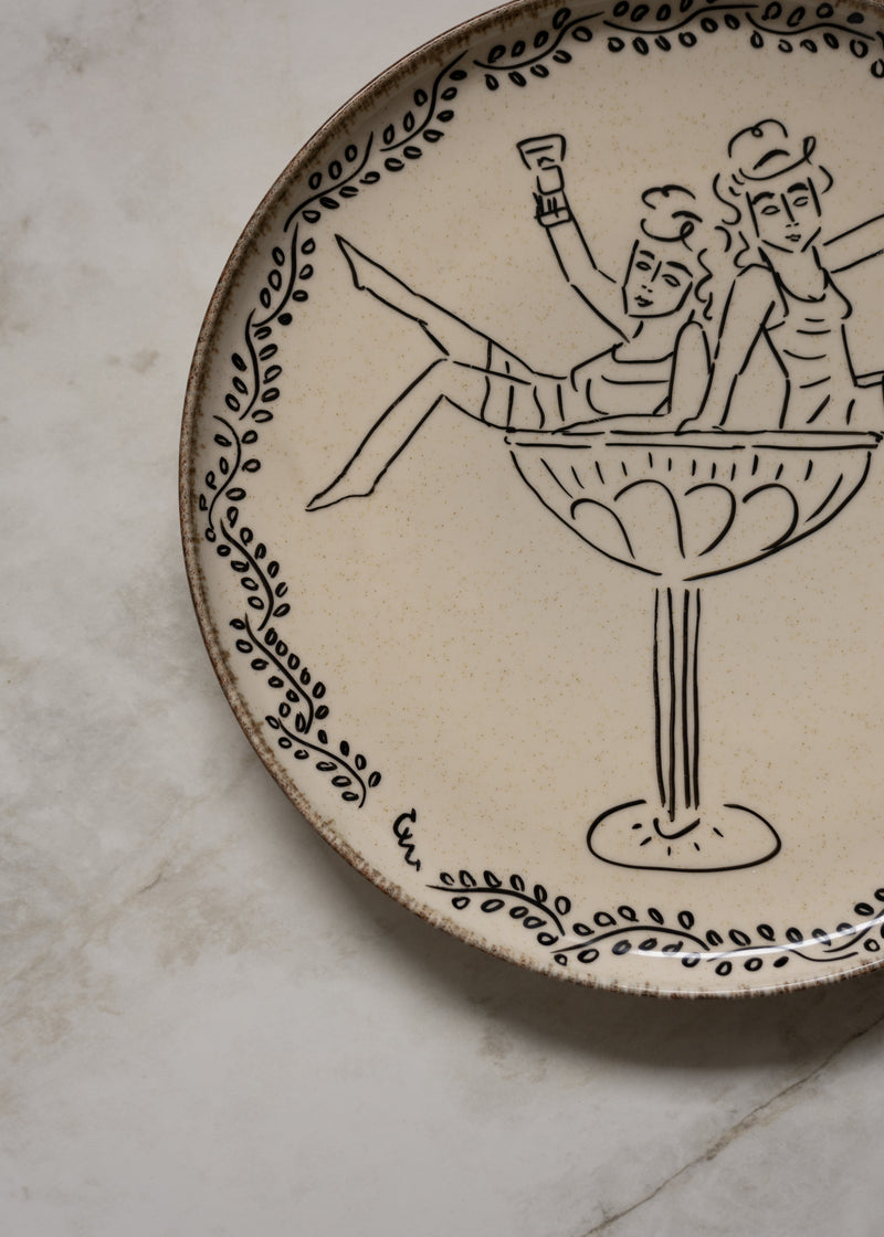 Hand-drawn Roman figures in decorative ceramic dish detail view