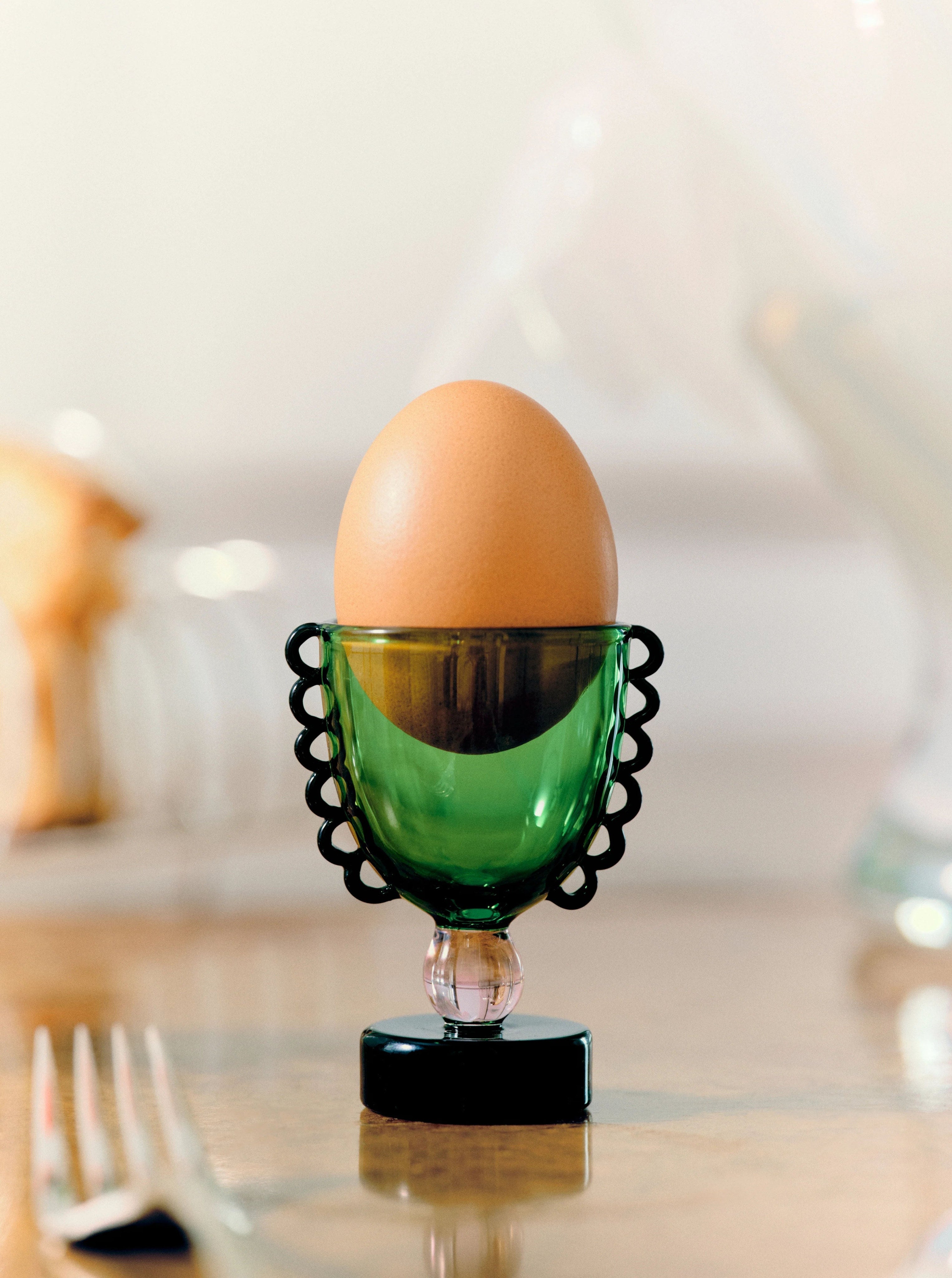 Coco Egg Cup Set — close-up of green glass with egg