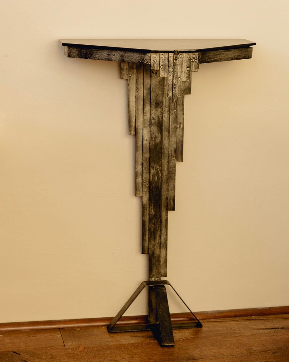 Sculptural Console Table — angled view against a neutral wall
