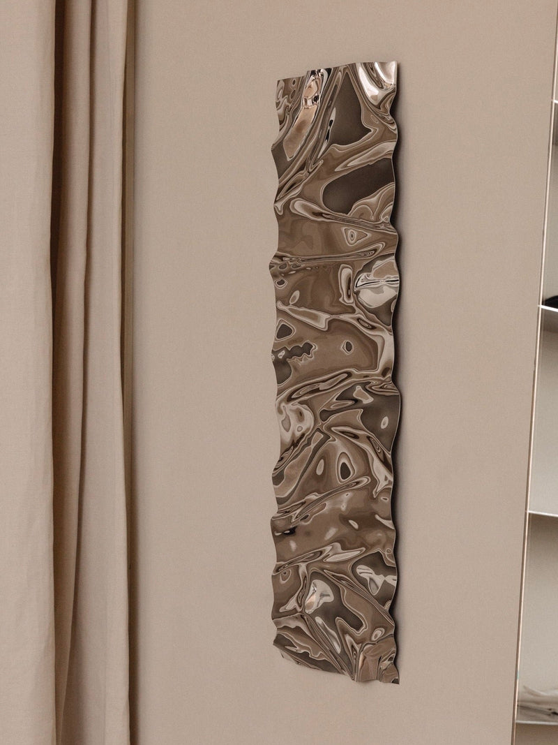 Psychedelic Mirror Long — close-up of reflective wavy surface on wall
