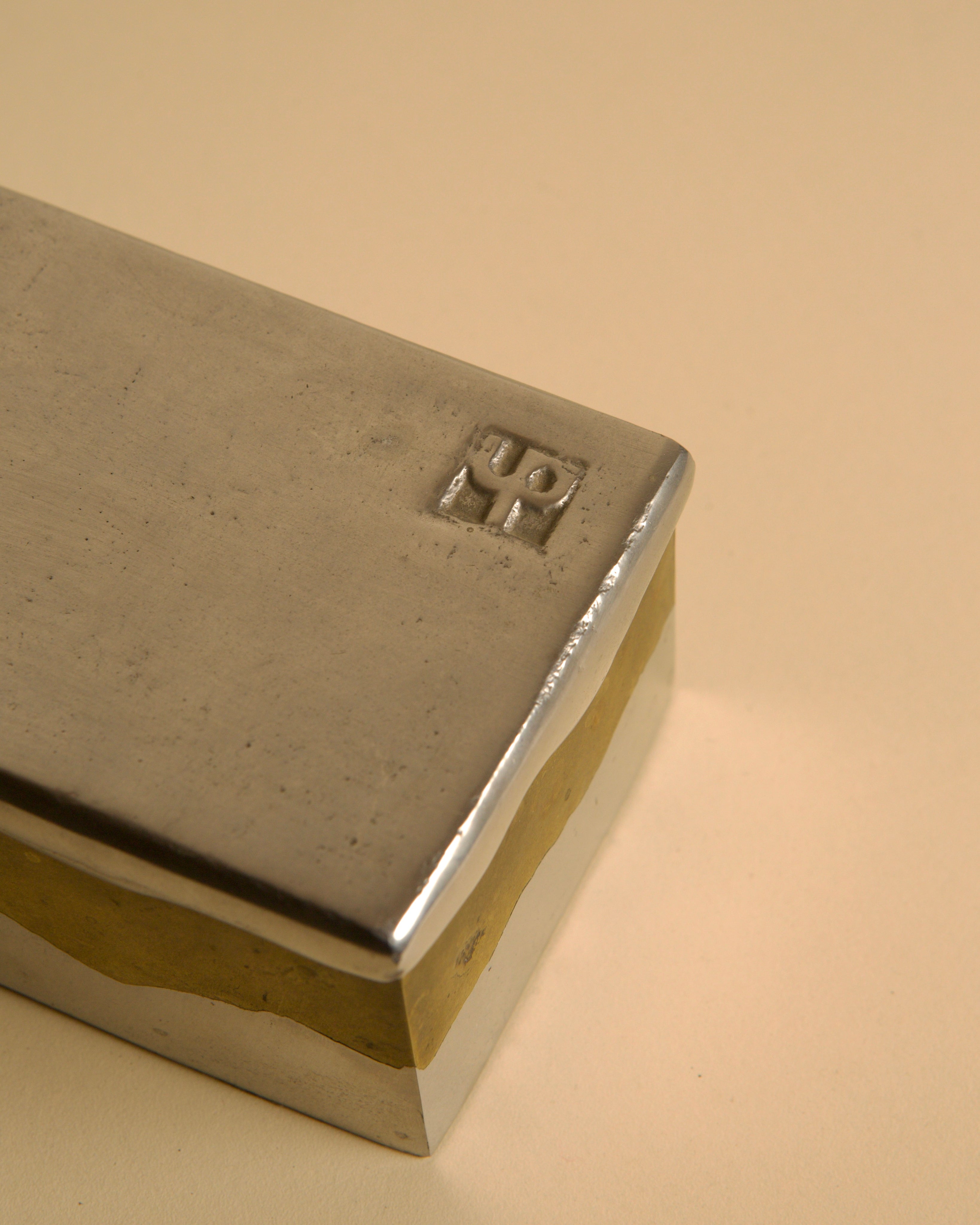 Brutalist metal and brass box by David Marshall, 1970s — side angle showing brushed metal finish
