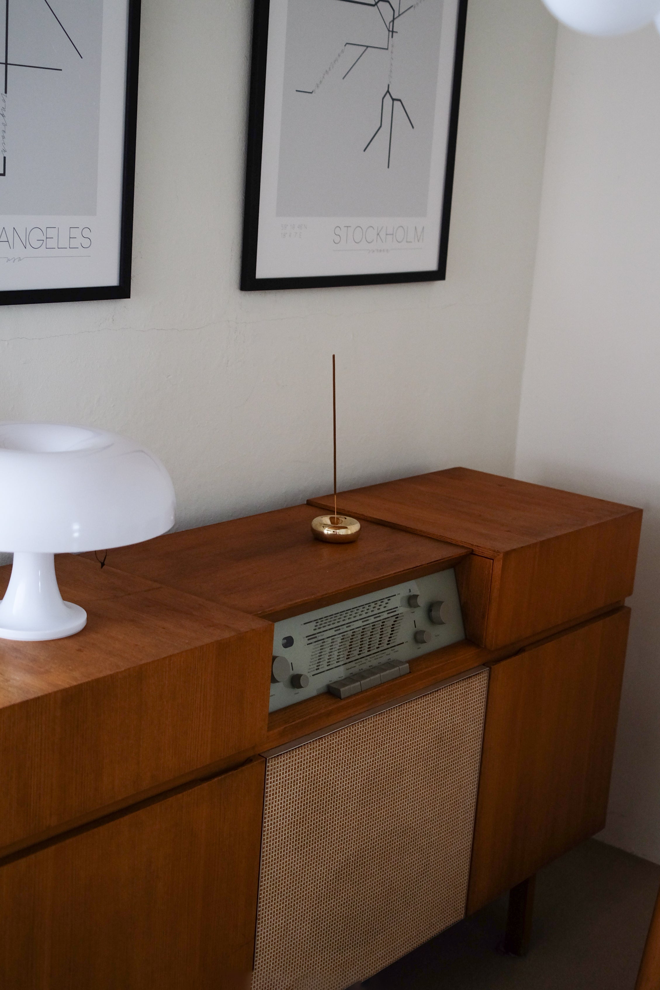 BASIN Incense Holder — top view on mid-century modern cabinet