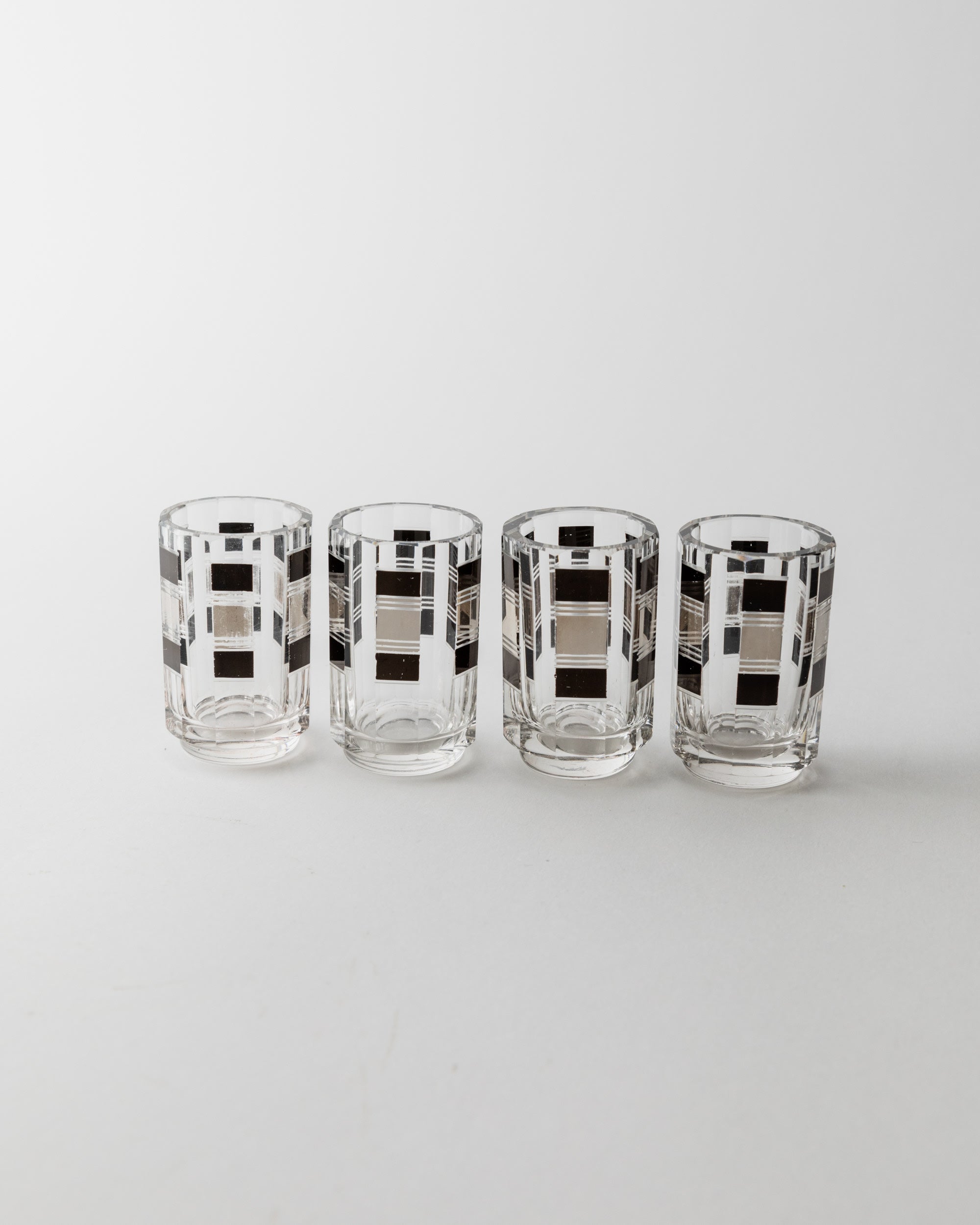 Liqueur Set Art Deco by Karl Palda 1930s — side angle of clear glass with black accents