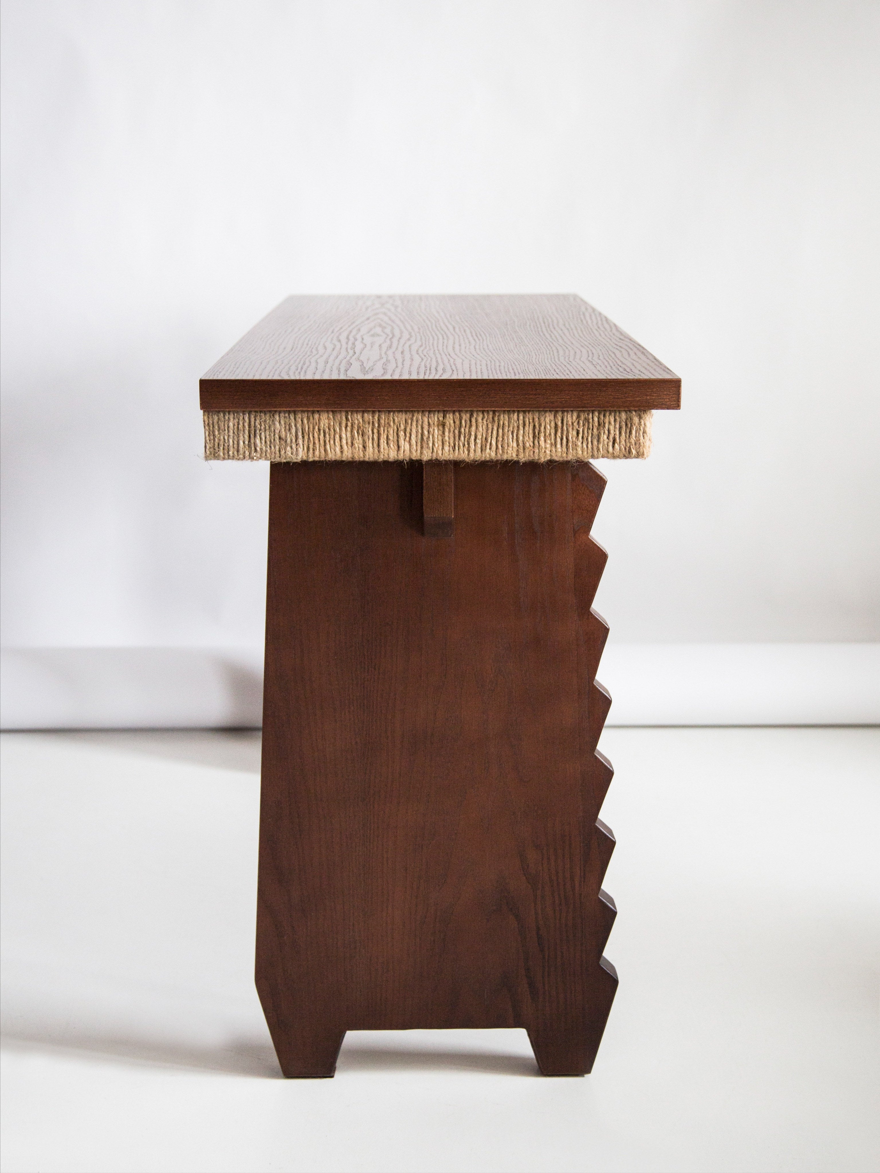 Escritorio Desk — side view highlighting wooden texture and fringe detail