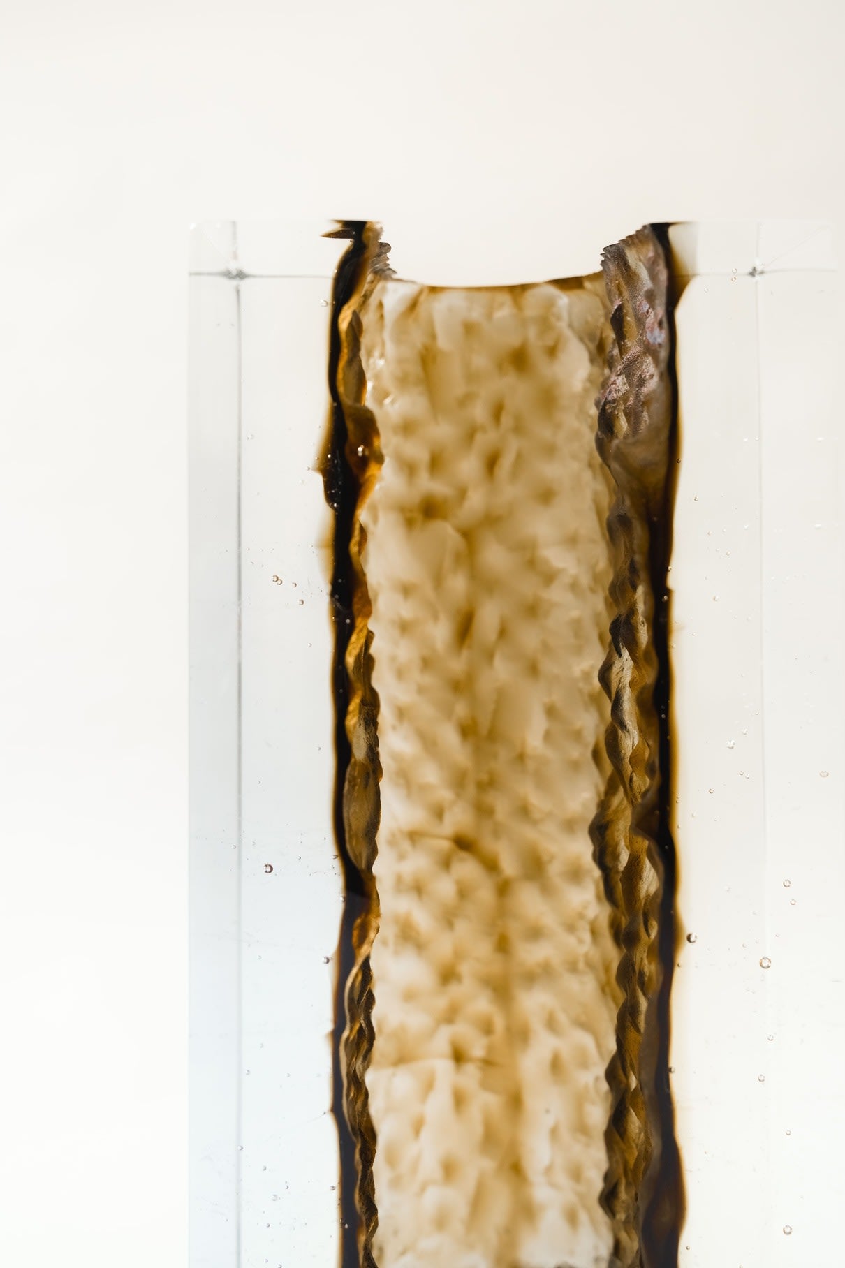 Brutalism Candle Holders in Glass - GEODA Collection — top view of textured glass with candle wax