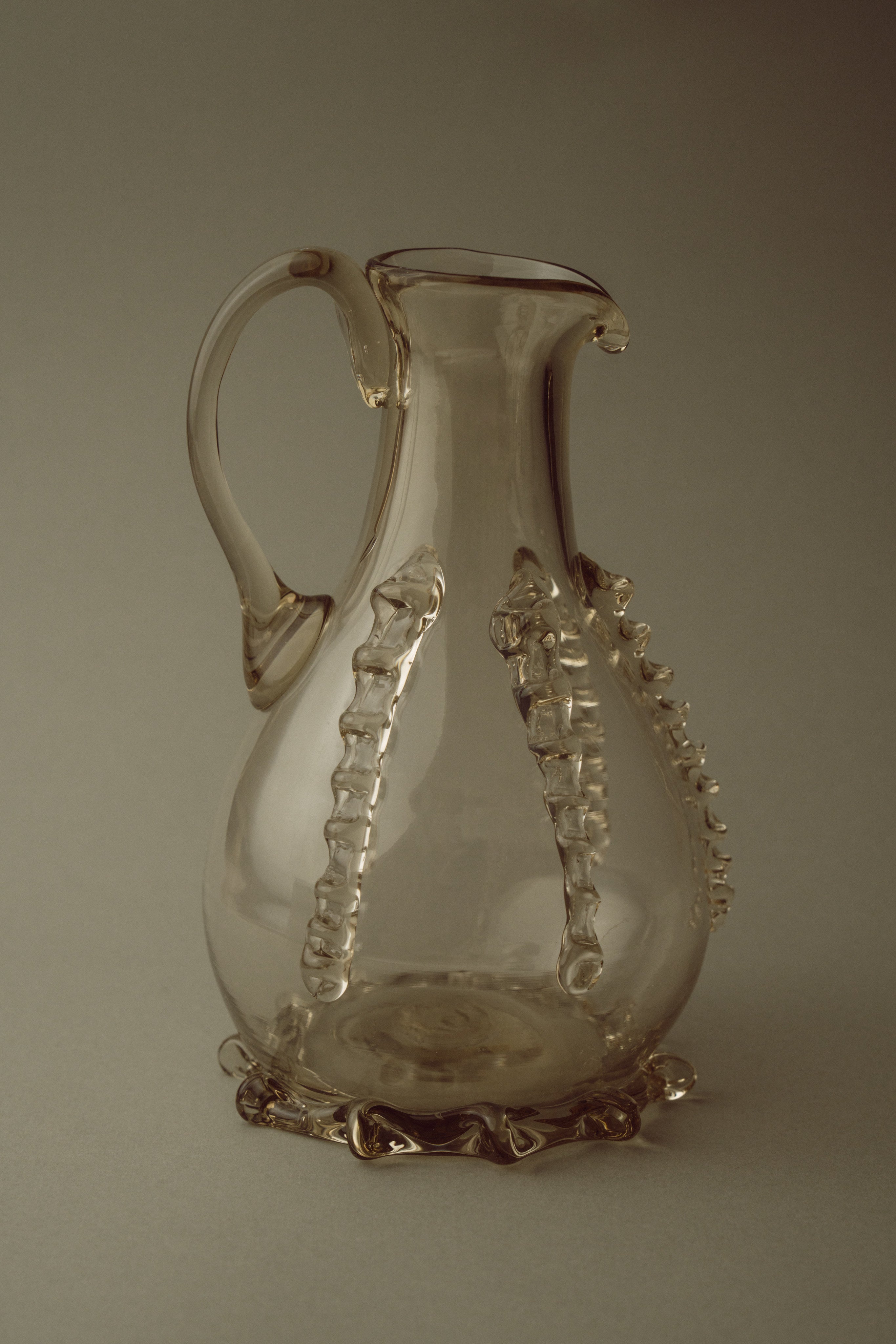 Contemporary Carafes in Glass with ornaments - Mouthblown Collection — back view highlighting glass texture and ornamentation