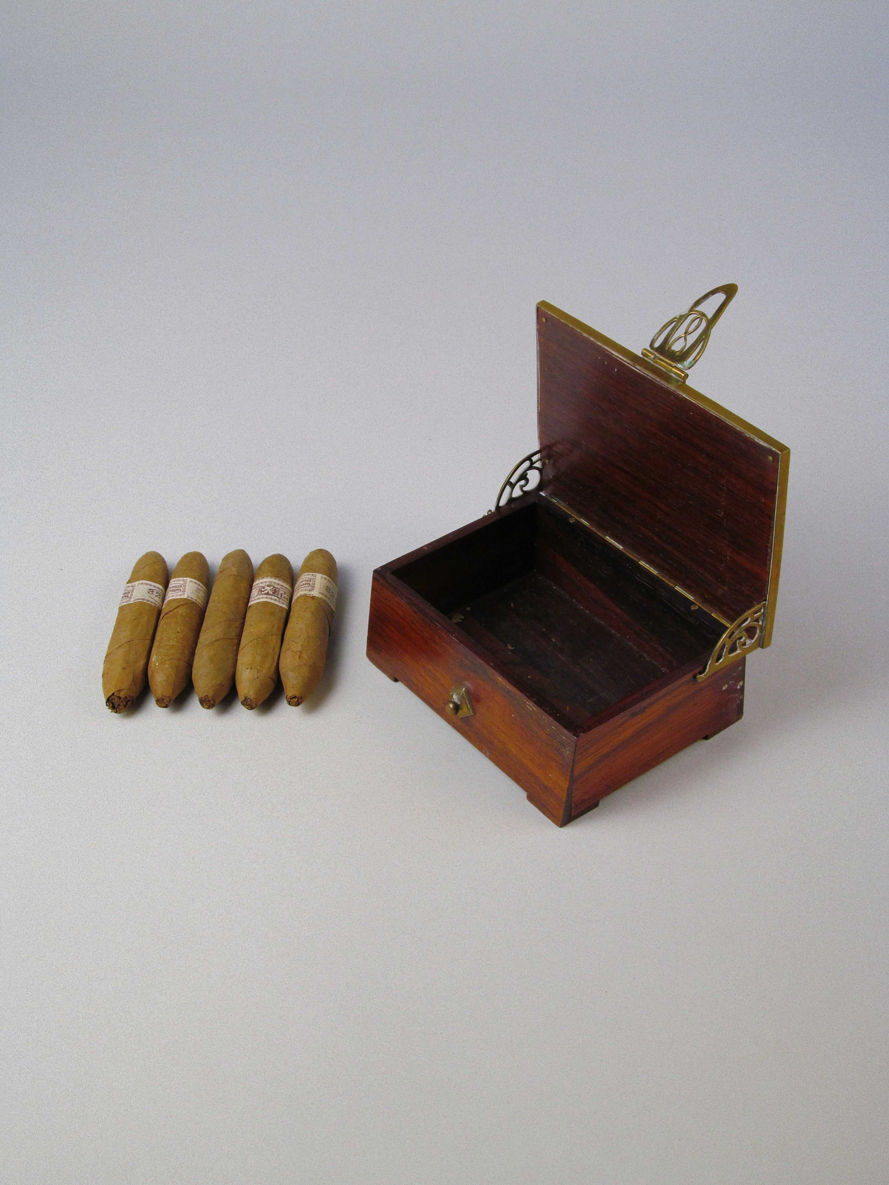 Seccessionist Cigar Box c.1910 With Contents — open box with cigars on gray background