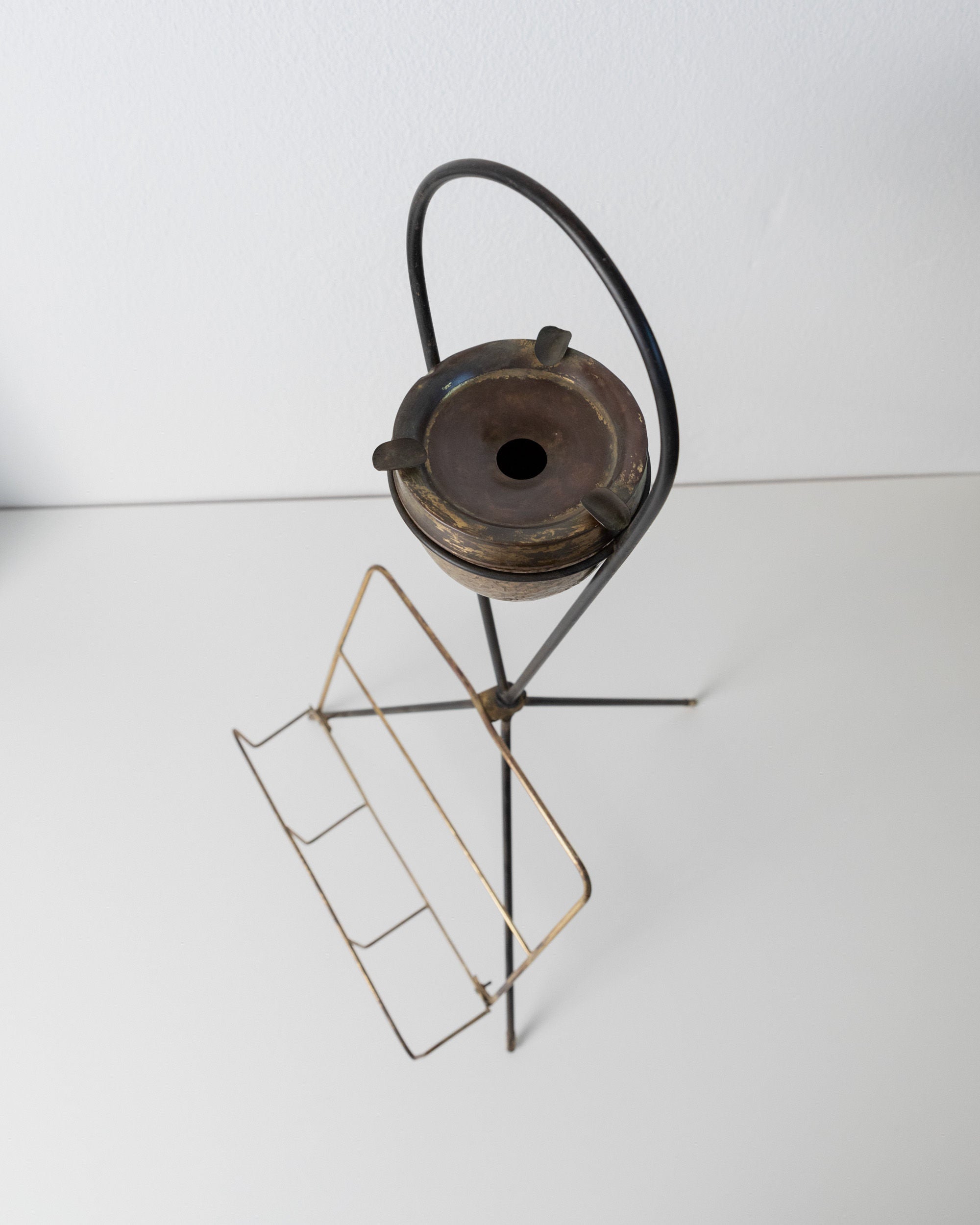 Brass Magazine Rack and Ashtray 1960s — top view of brass ashtray and rack