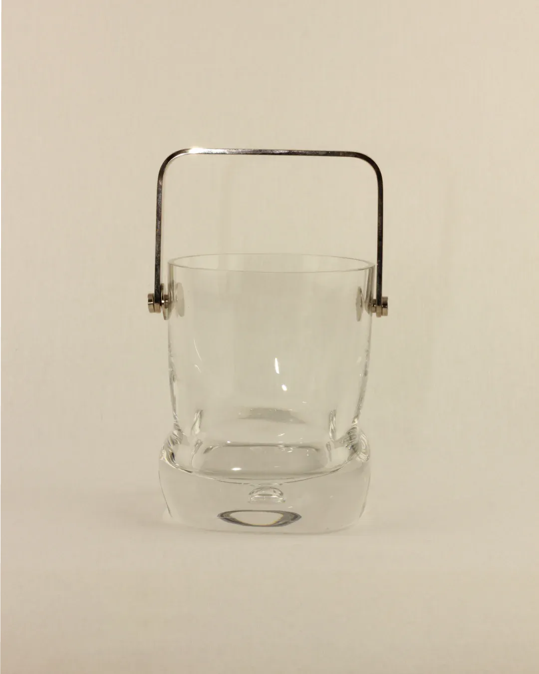 A sparkling crystal ice bucket, perfect for keeping drinks chilled at parties and events