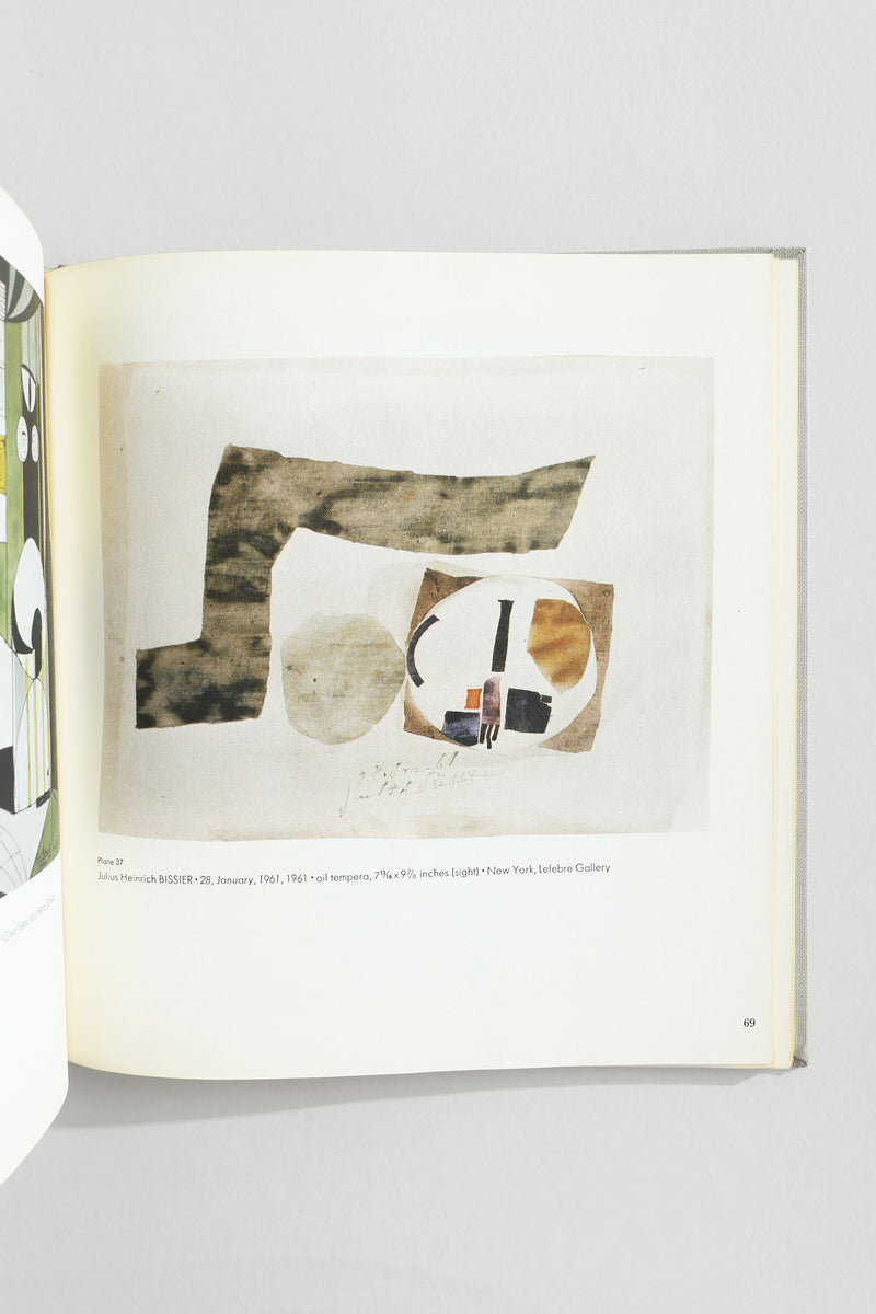 Open art book showing Julius Heinrich Bissier abstract collage page