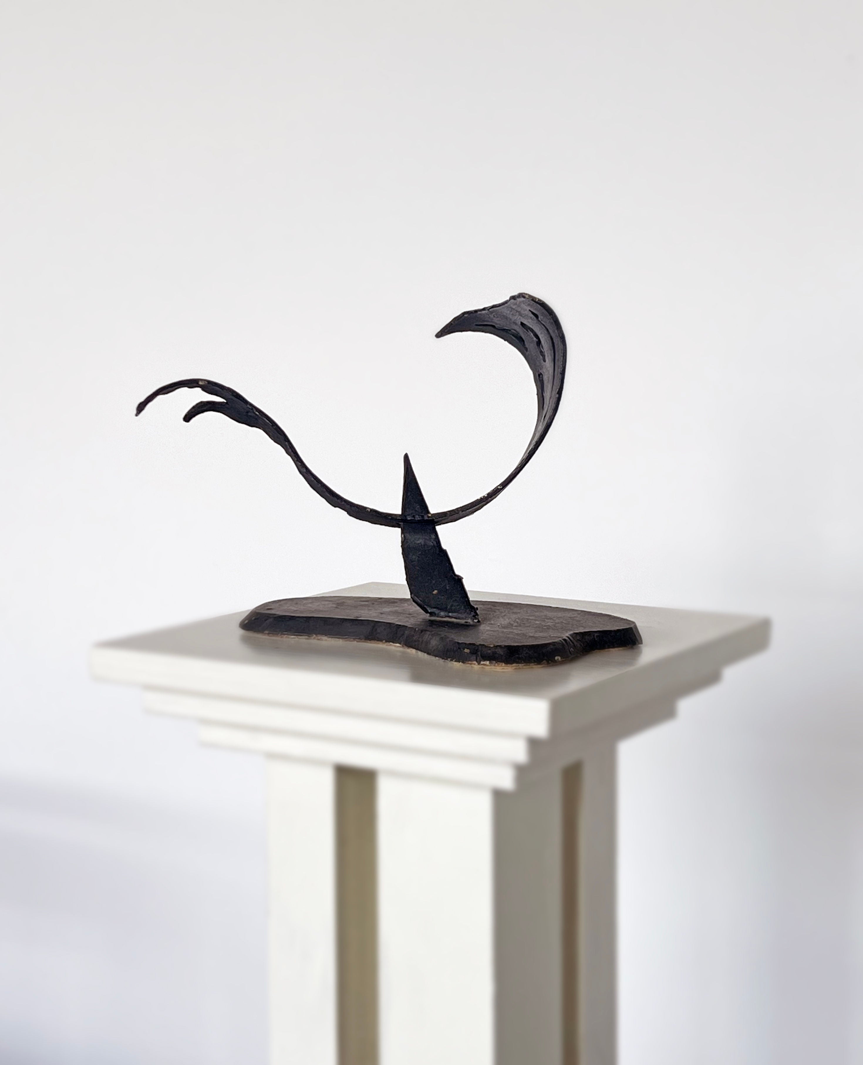 Brutalist iron ribbon sculpture