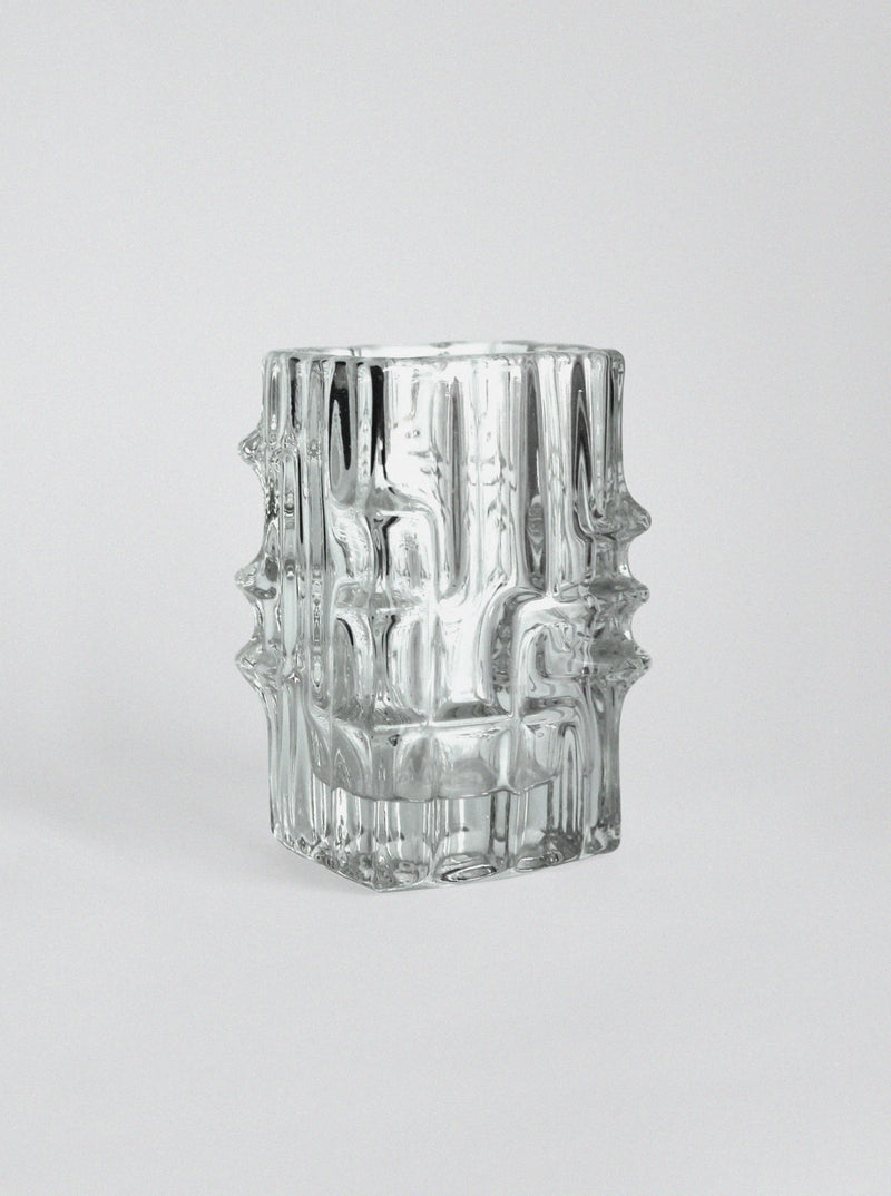 Clear textured glass vase with geometric ridged pattern design
