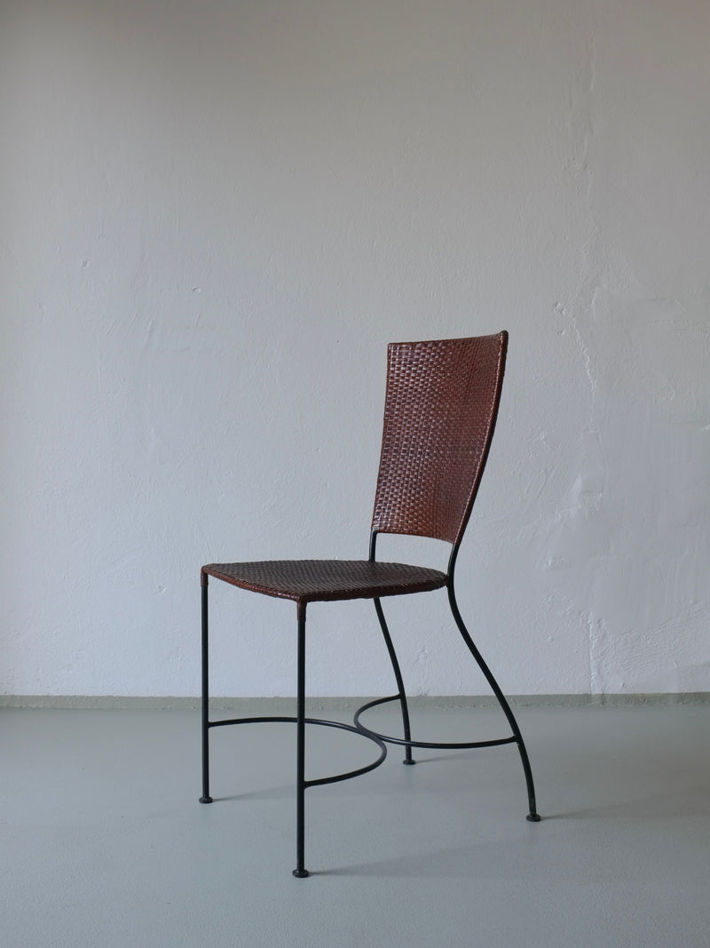 Belgian wrought iron chair with woven rattan seat and high back
