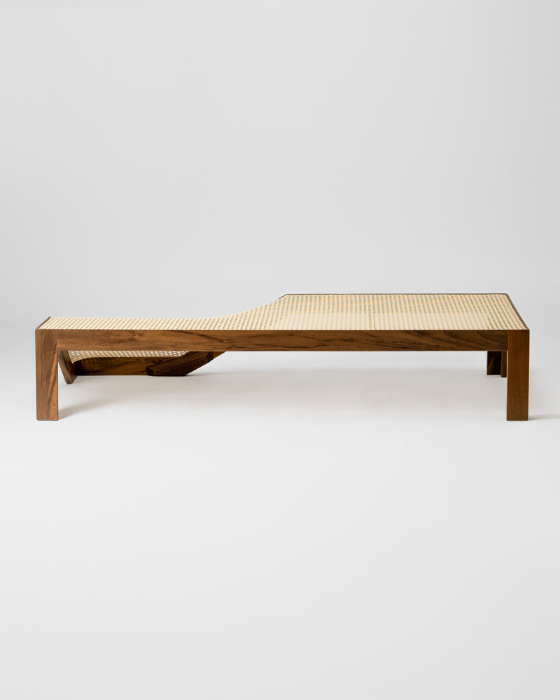 Modern wooden center table with woven cane top and lower shelf