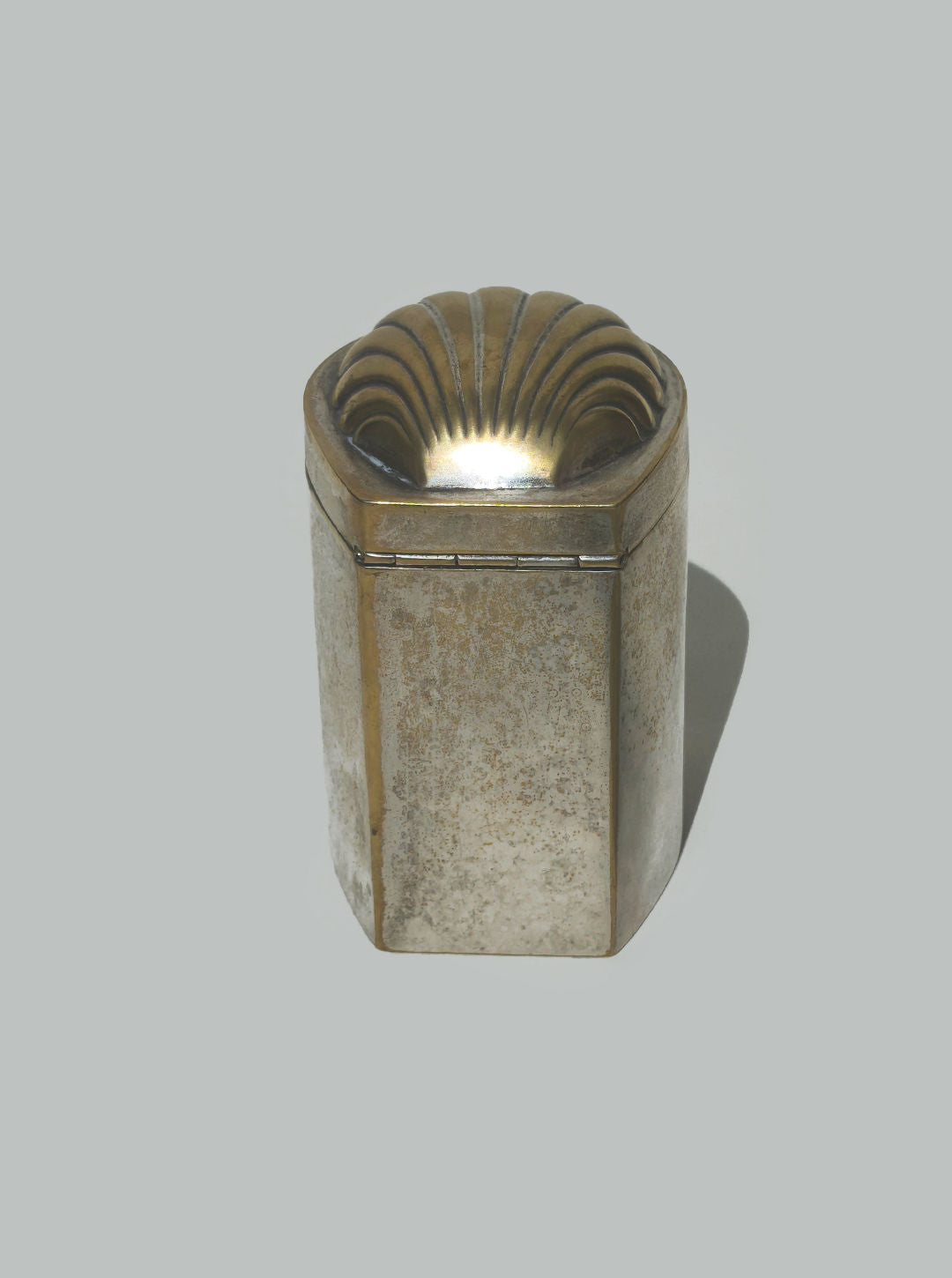 Shell-shaped patina brass decorative box with hinged lid