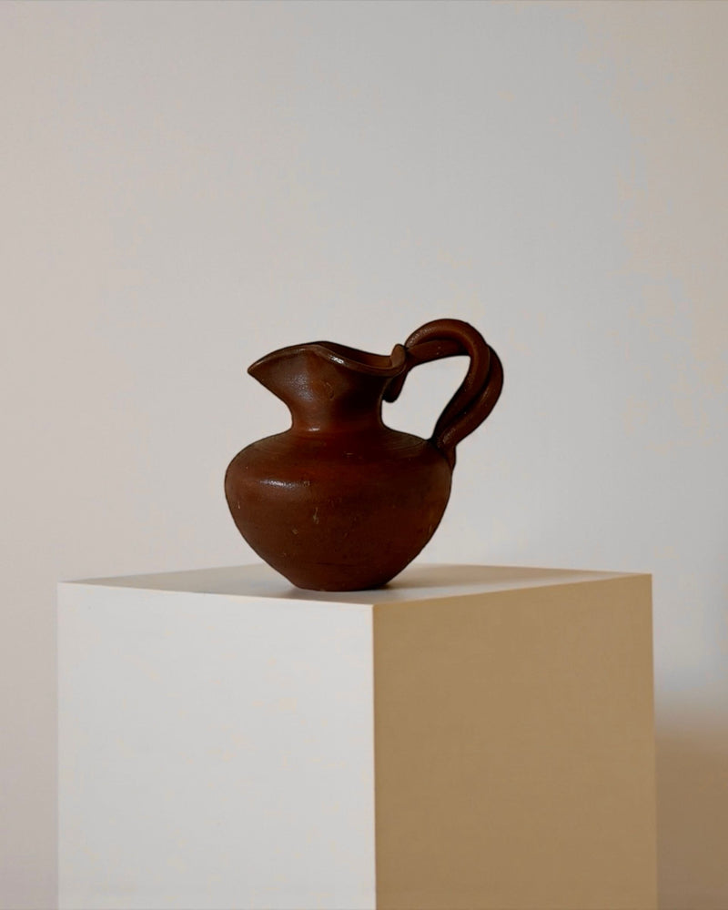 Small handcrafted ceramic pitcher in rich brown glaze by Flock Studio