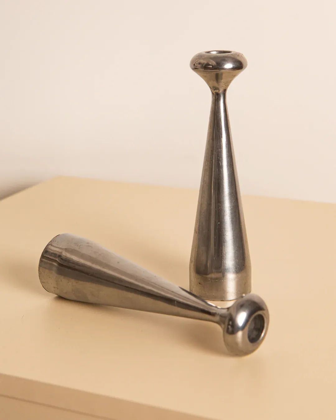 Pair of 80's aluminum “Quille” Candleholders