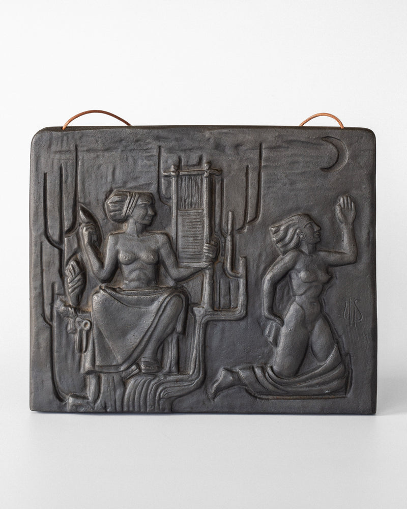 Egyptian-inspired cast iron wall relief depicting seated and kneeling figures, 1960s