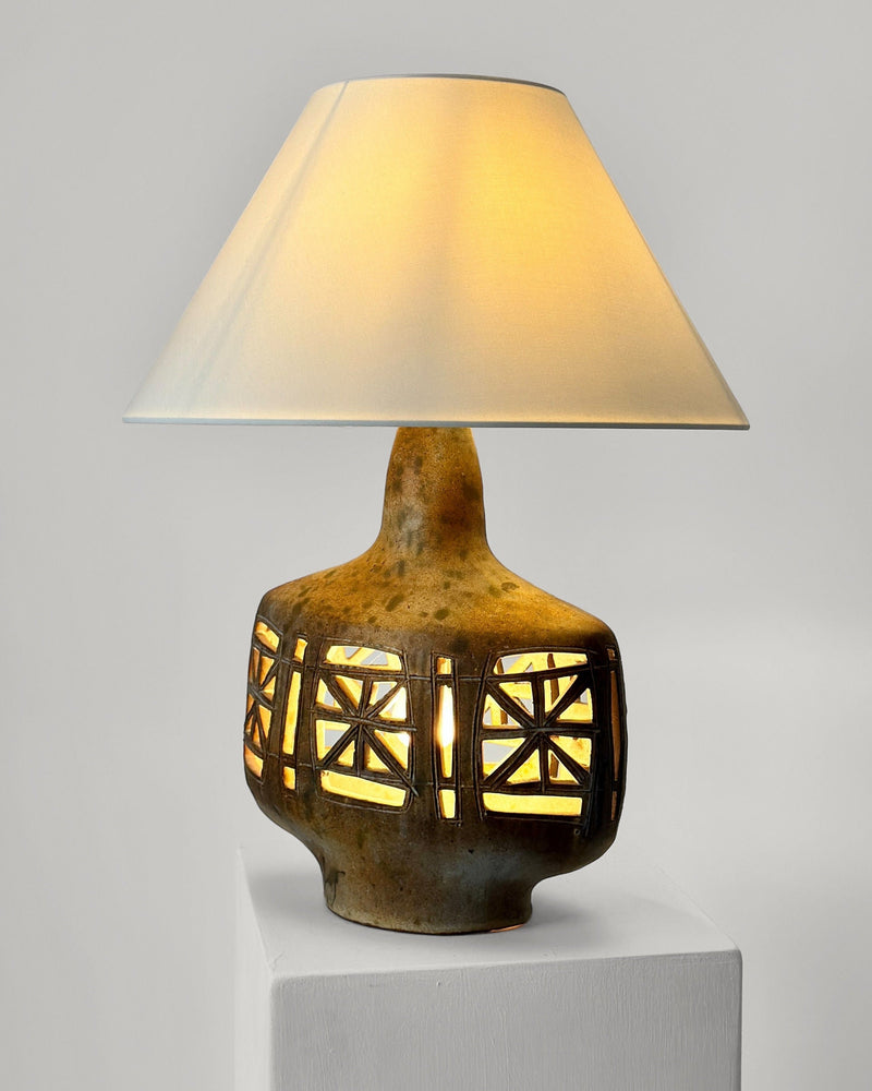 Mid-century ceramic table lamp with geometric cutout pattern by Agnes Escala