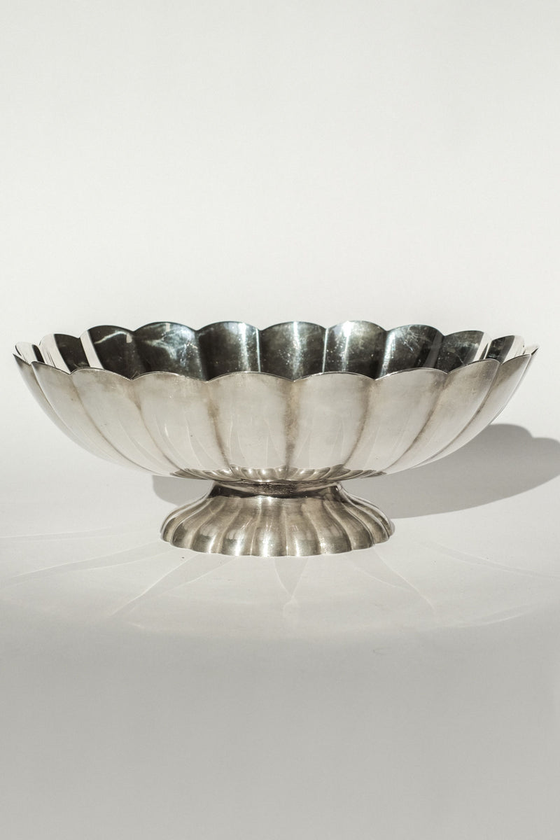 The septembre studios Silverplated Centerpiece features a polished vintage finish, scalloped edge, and fluted base, shown against a plain white background.