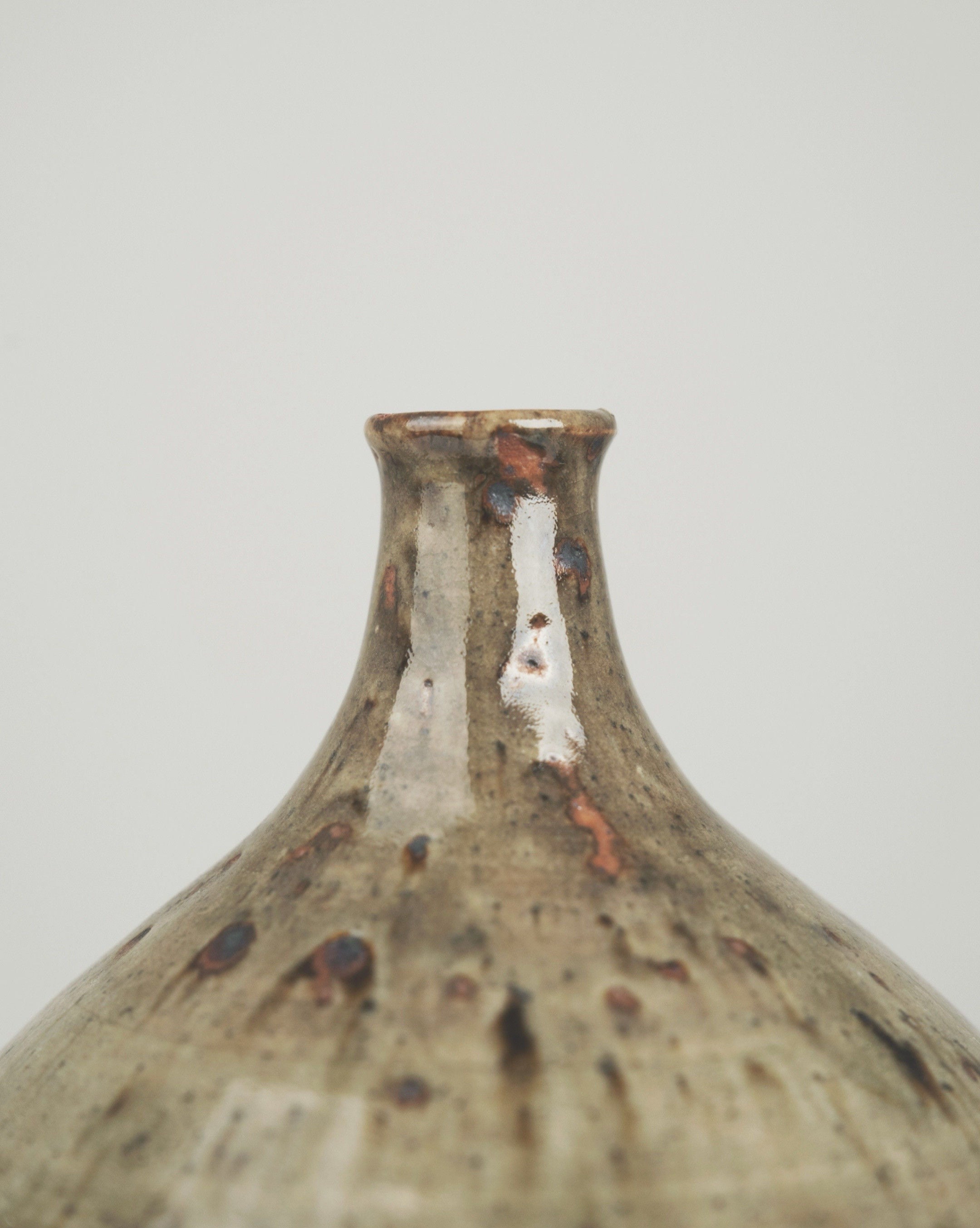 Neck detail of speckled ceramic Soliflore vase by Tiffoche