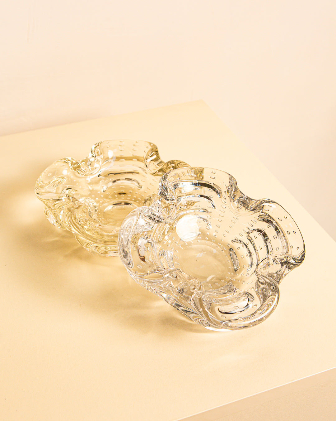 Clear Murano glass ashtrays with sculptural curved edges, 1980s