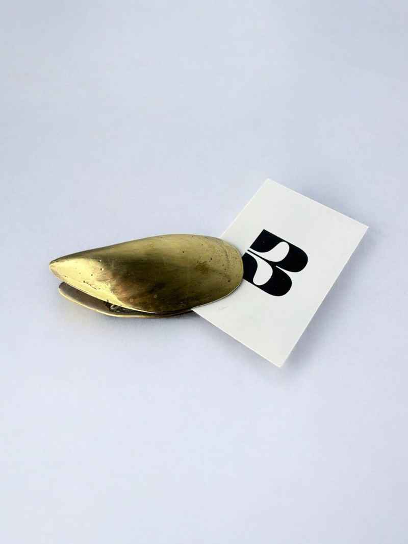 Vintage brass mussel shell paperclip with business card detail