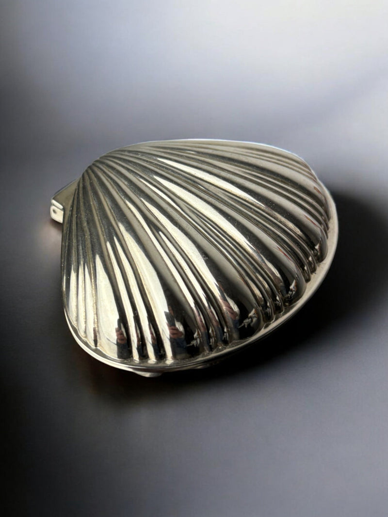 Silver plated shell jewelry box showing detailed ridged surface texture